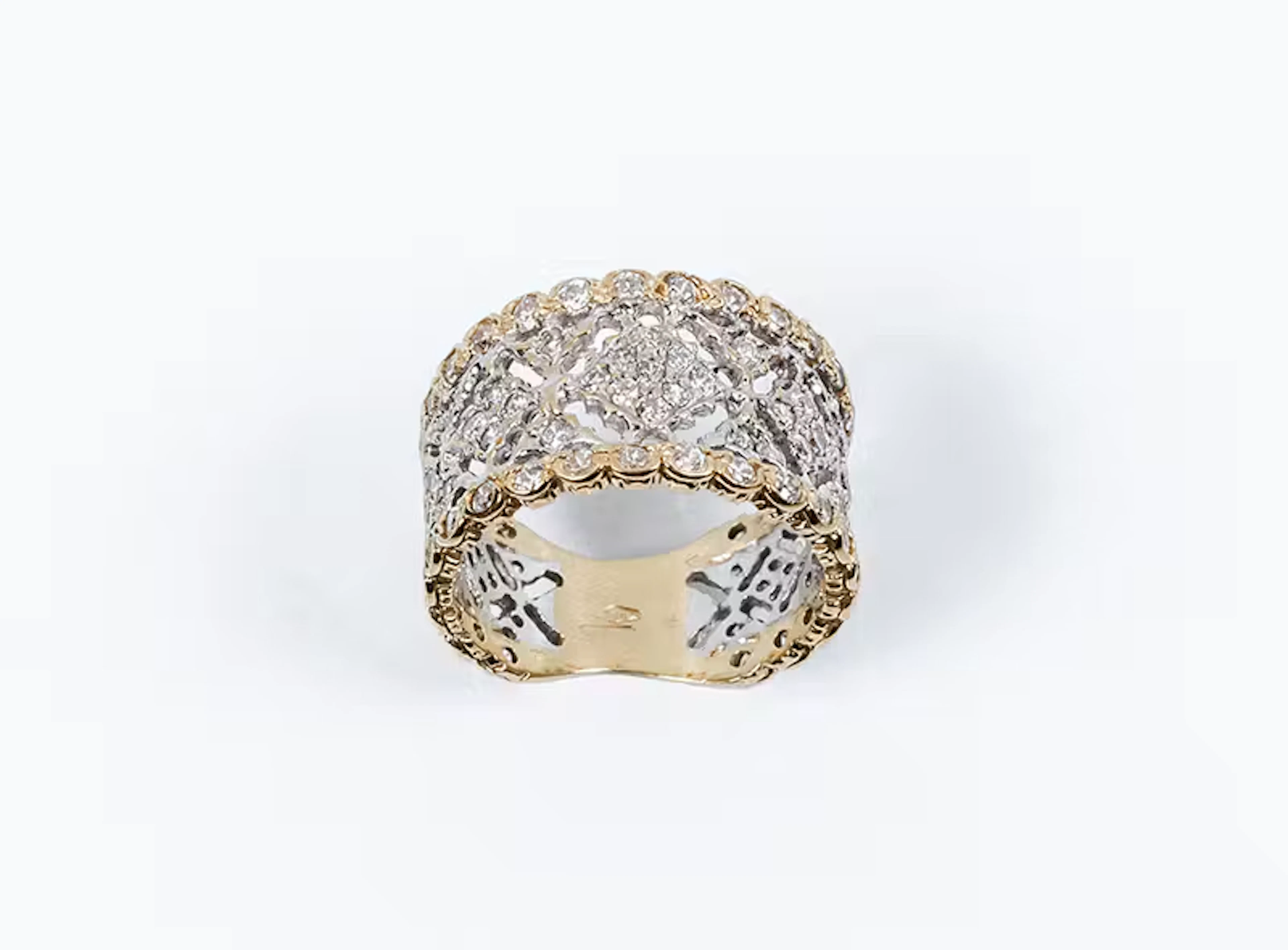 Sortija en oro amarillo y blanco 18 K con motivo...