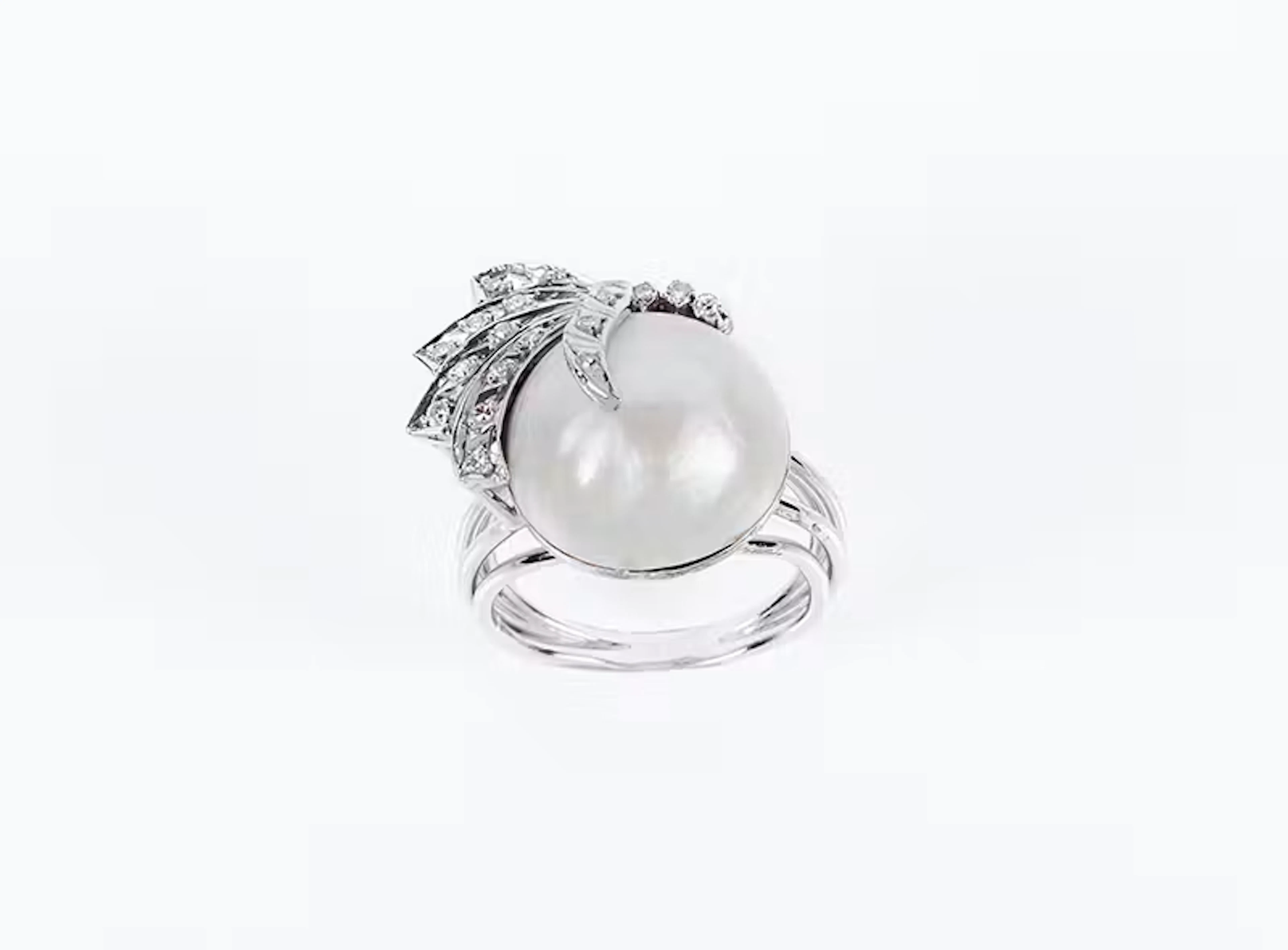 Sortija vintage en sólida montura de oro blanco 18 K con...