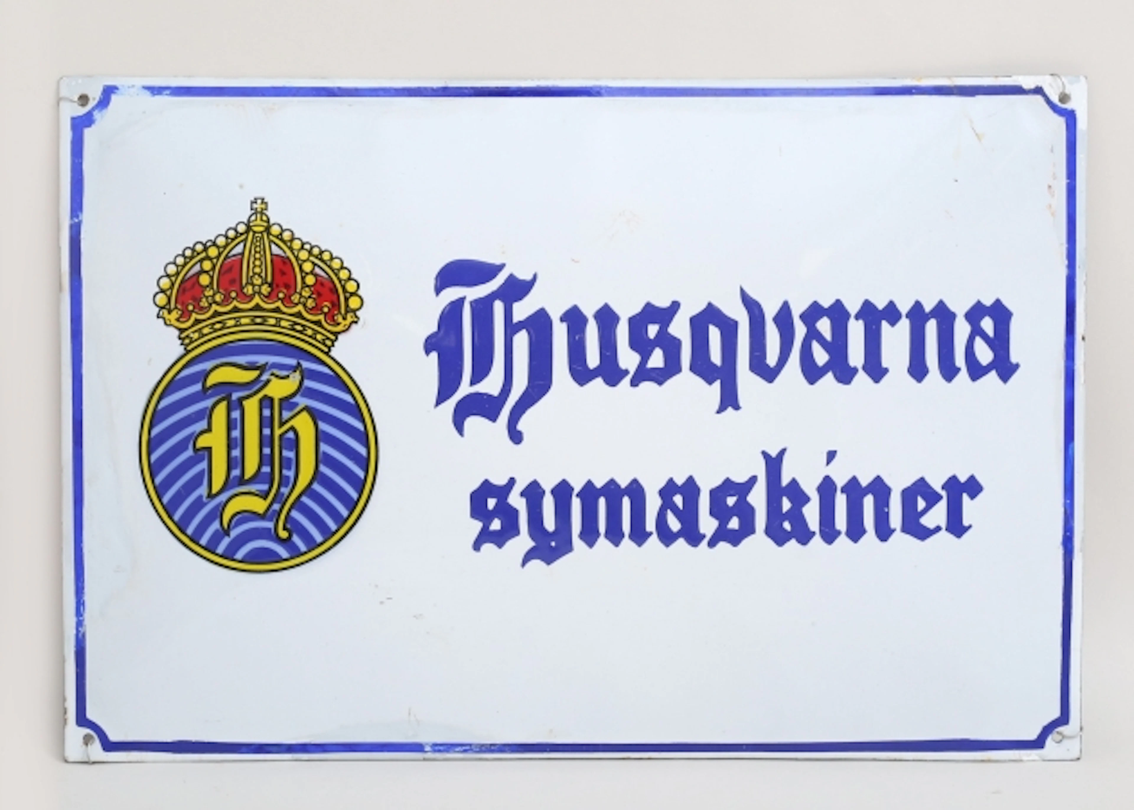 Emaljskylt Husqvarna Symaskiner