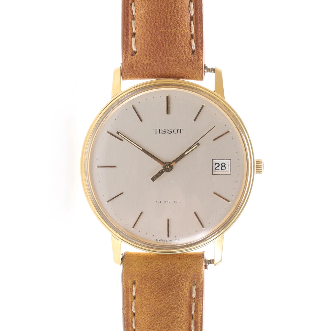HERRARMBANDSUR, Tissot, 18 k guld.