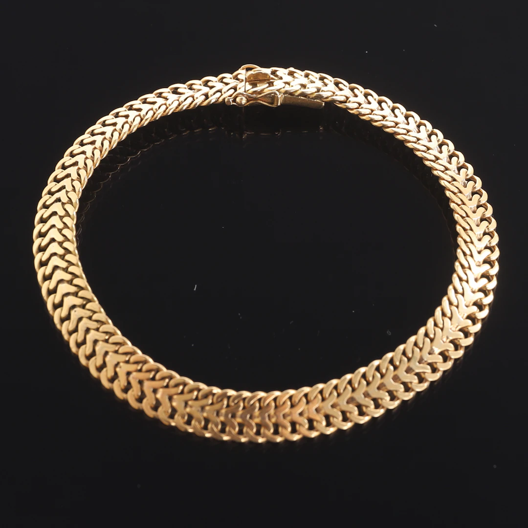 ARMBAND, 18 k guld, "Fiskben".
