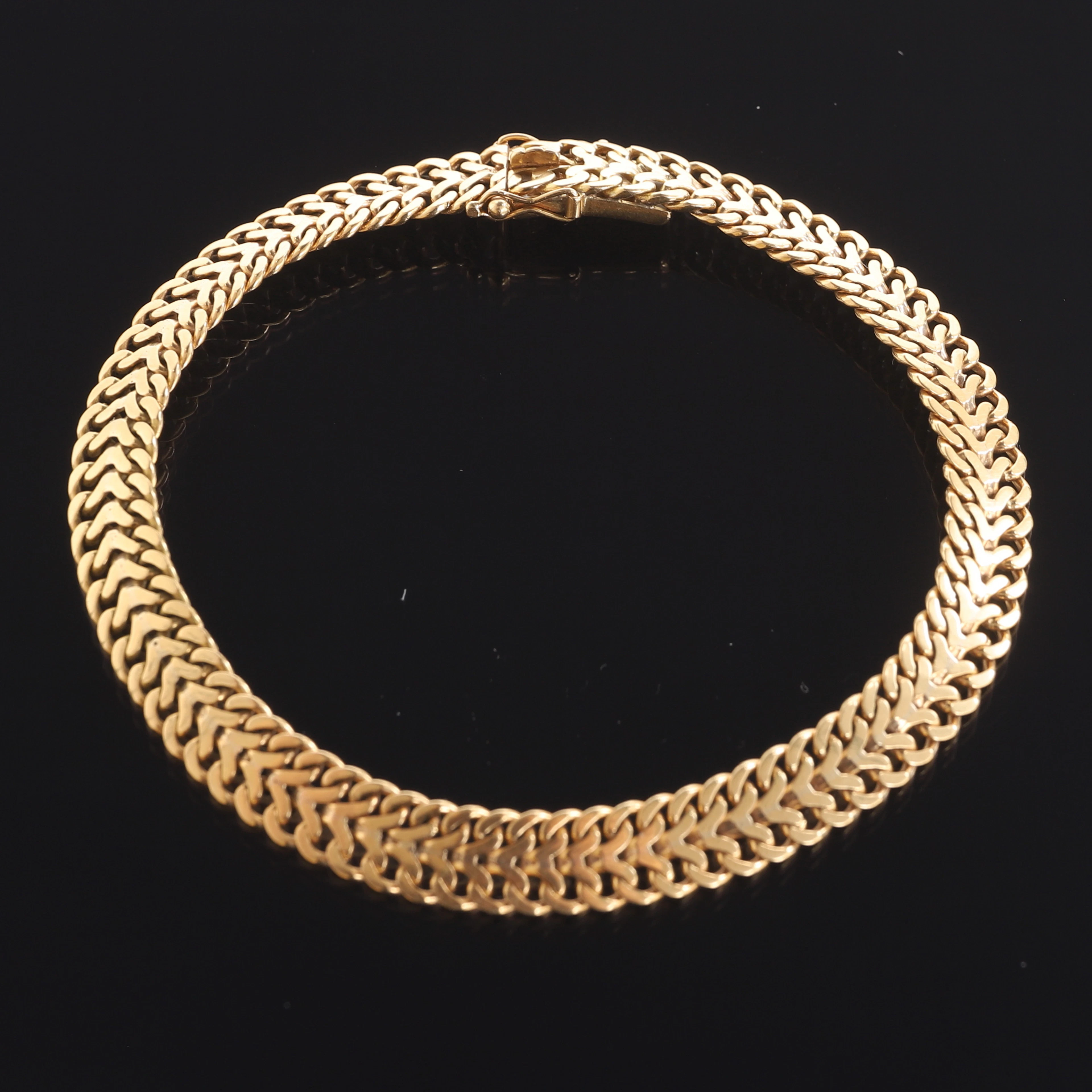 ARMBAND, 18 k guld, "Fiskben".