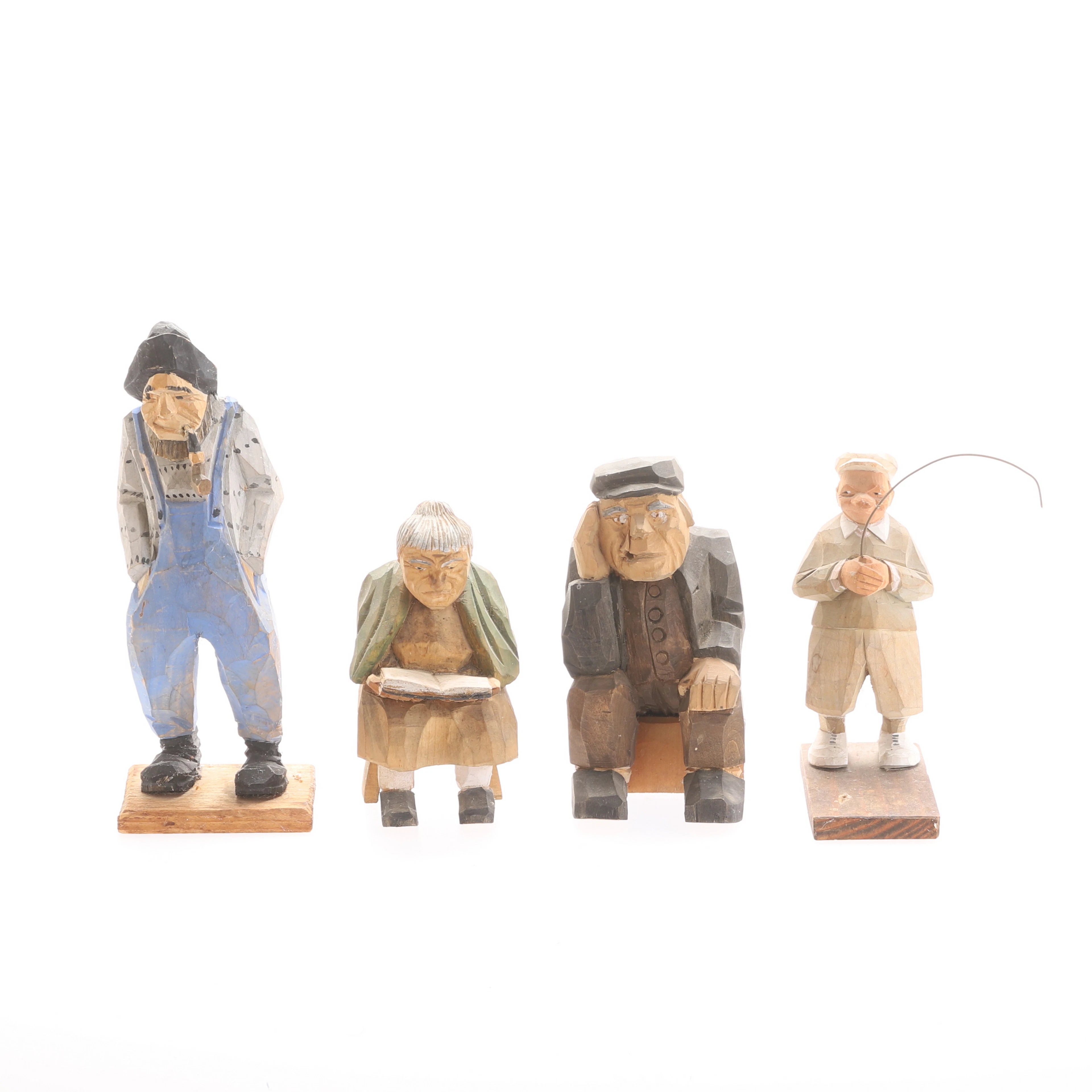 FIGURINER, 4 stycken, skulpterat trä.