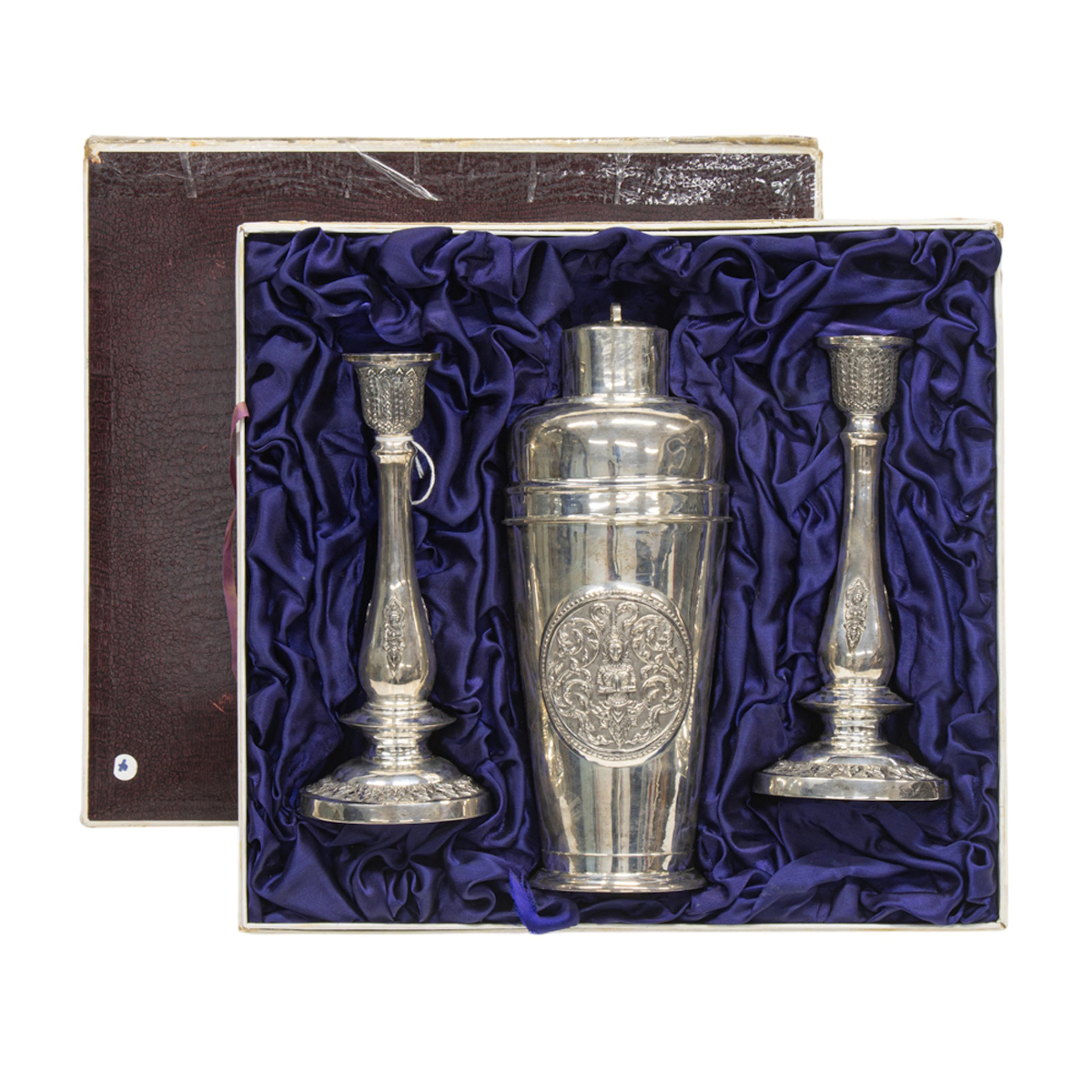 A boxed Siamese sterling group, retailed by E. Seng Chong, Bangkok
