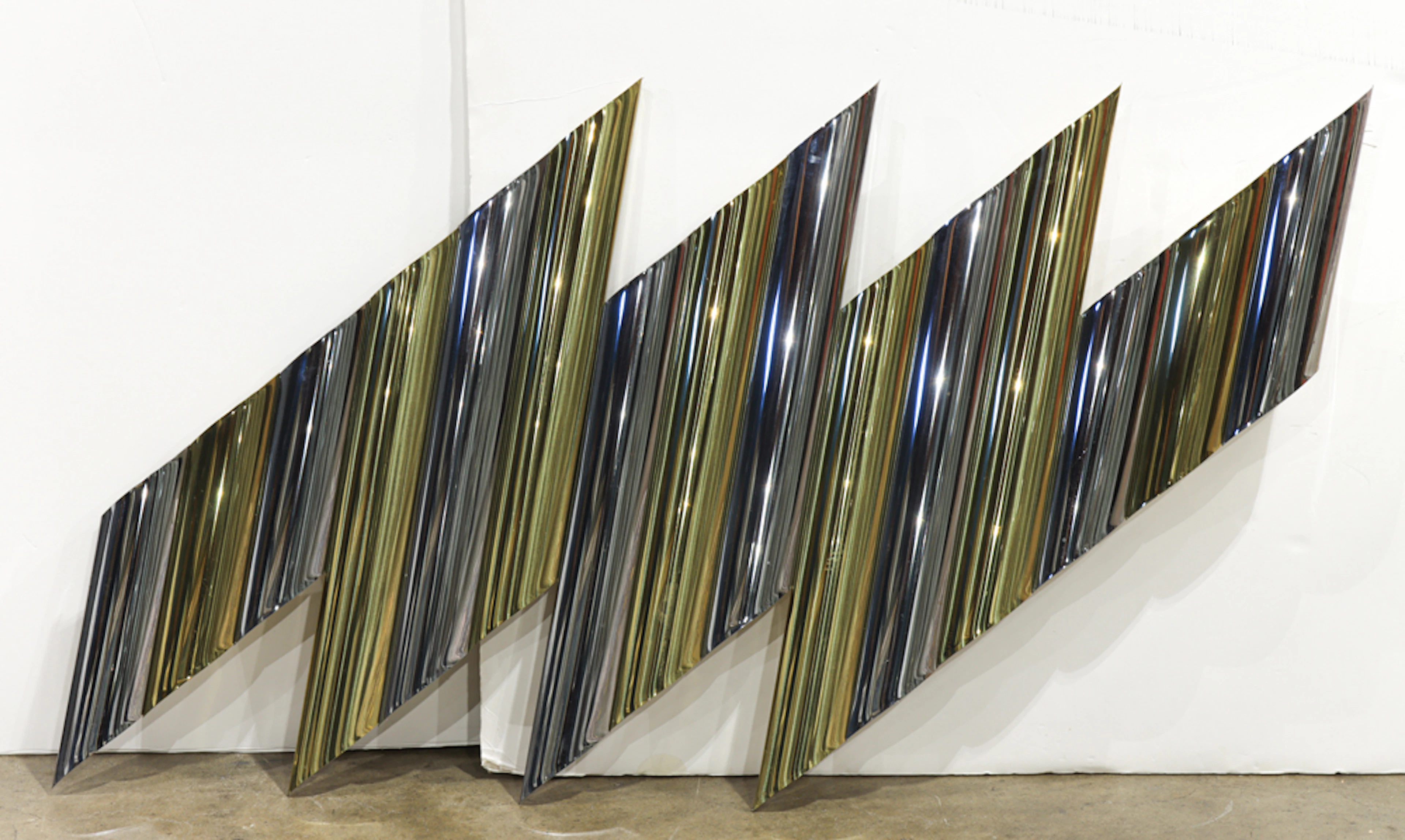 A Curtis Jere mixed metal 'Torrent' wall sculpture