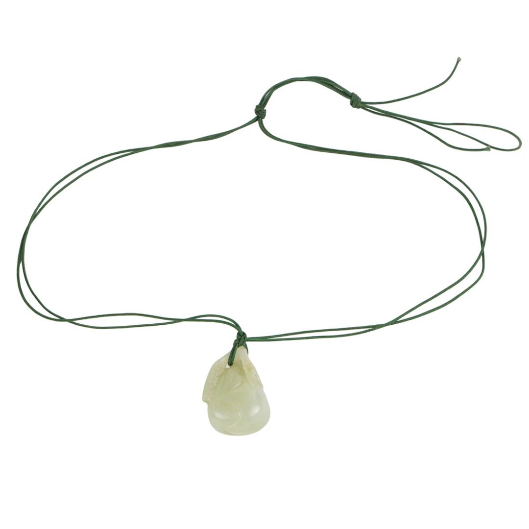 A Chinese white jade toggle. 1.5" across.