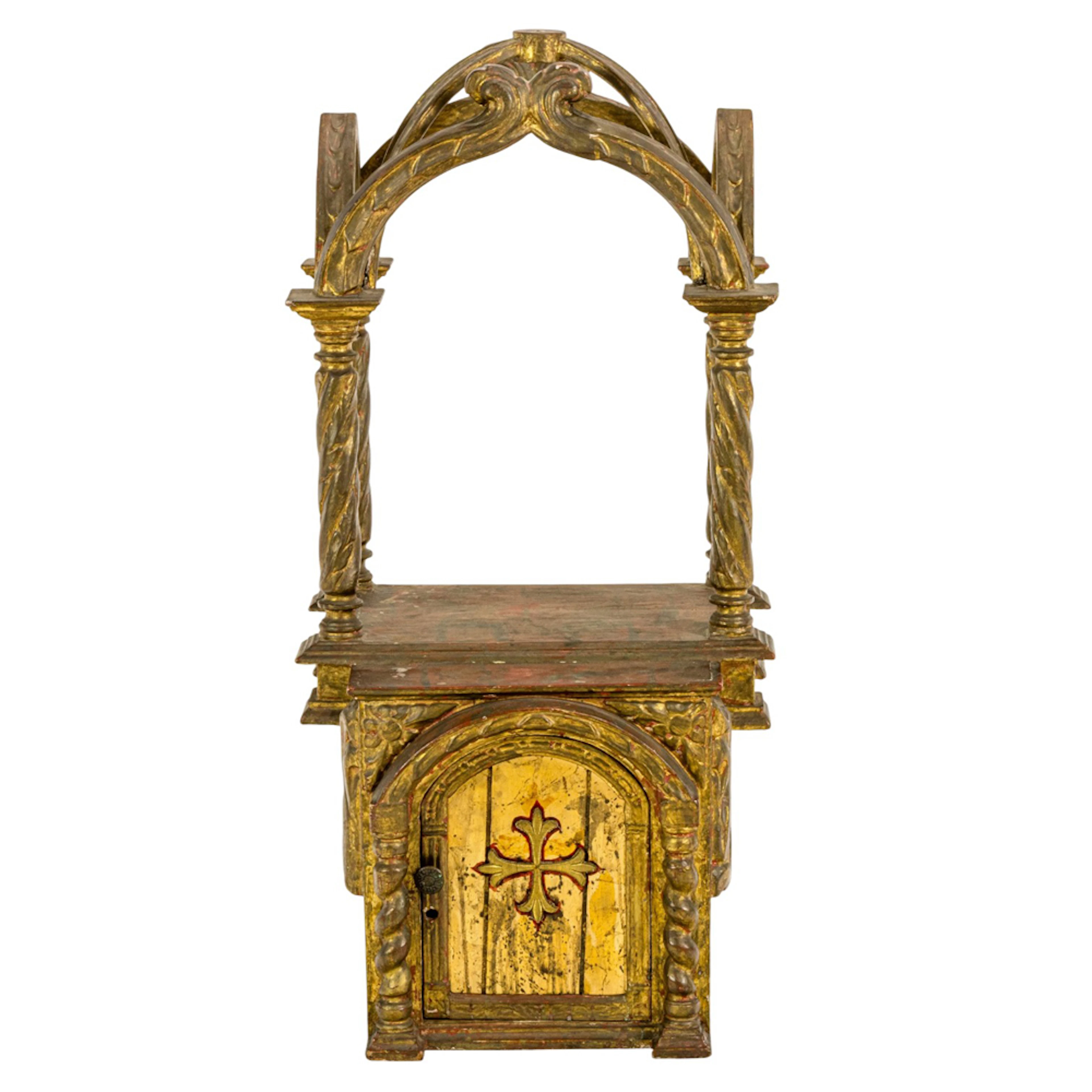 A Continental faux marbleized and giltwood tabernacle