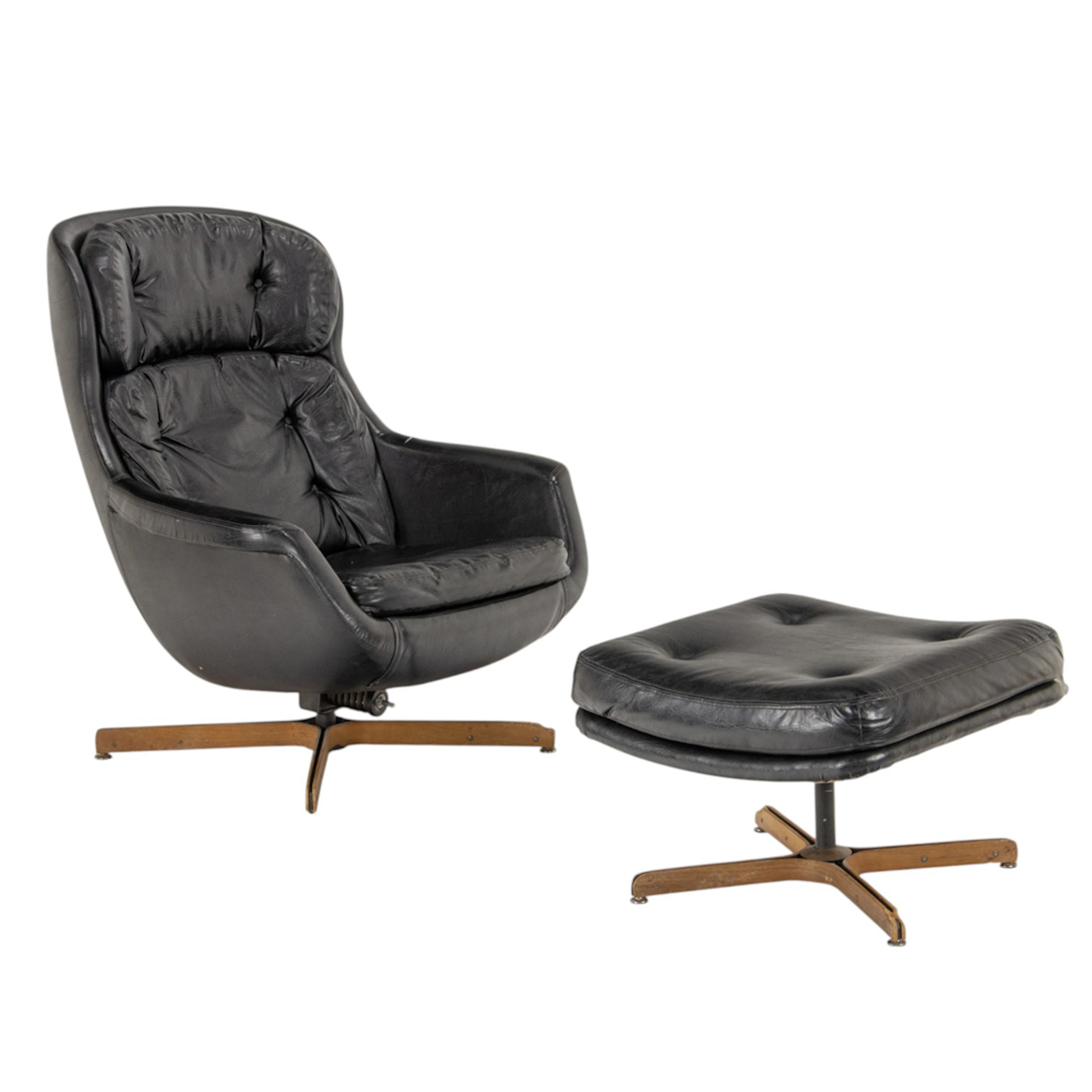 A Selig Mid-Century leather upholstered lounge chair with ottoman