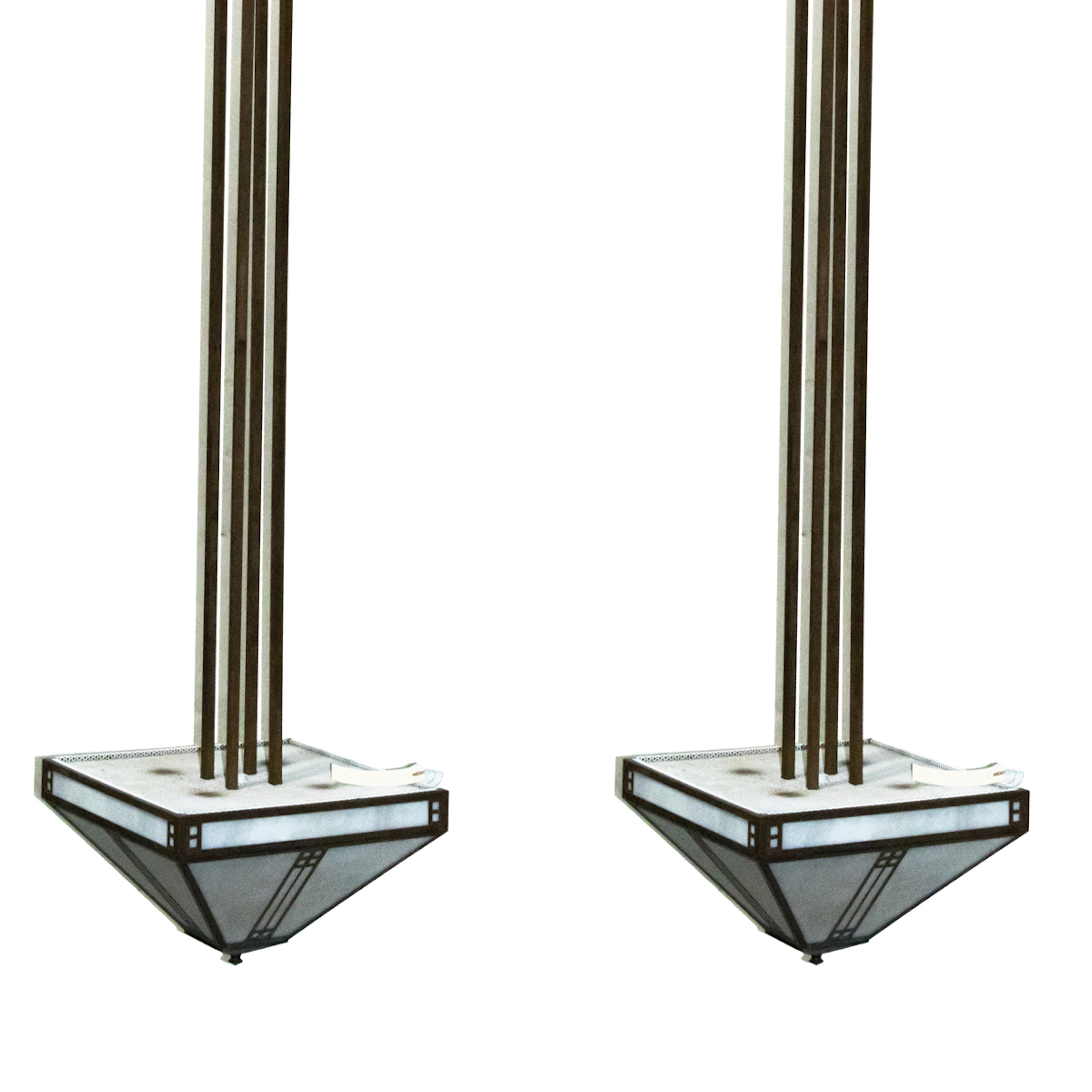 A large pair of Arroyo Craftsman hanging chandeliers in the Huntington