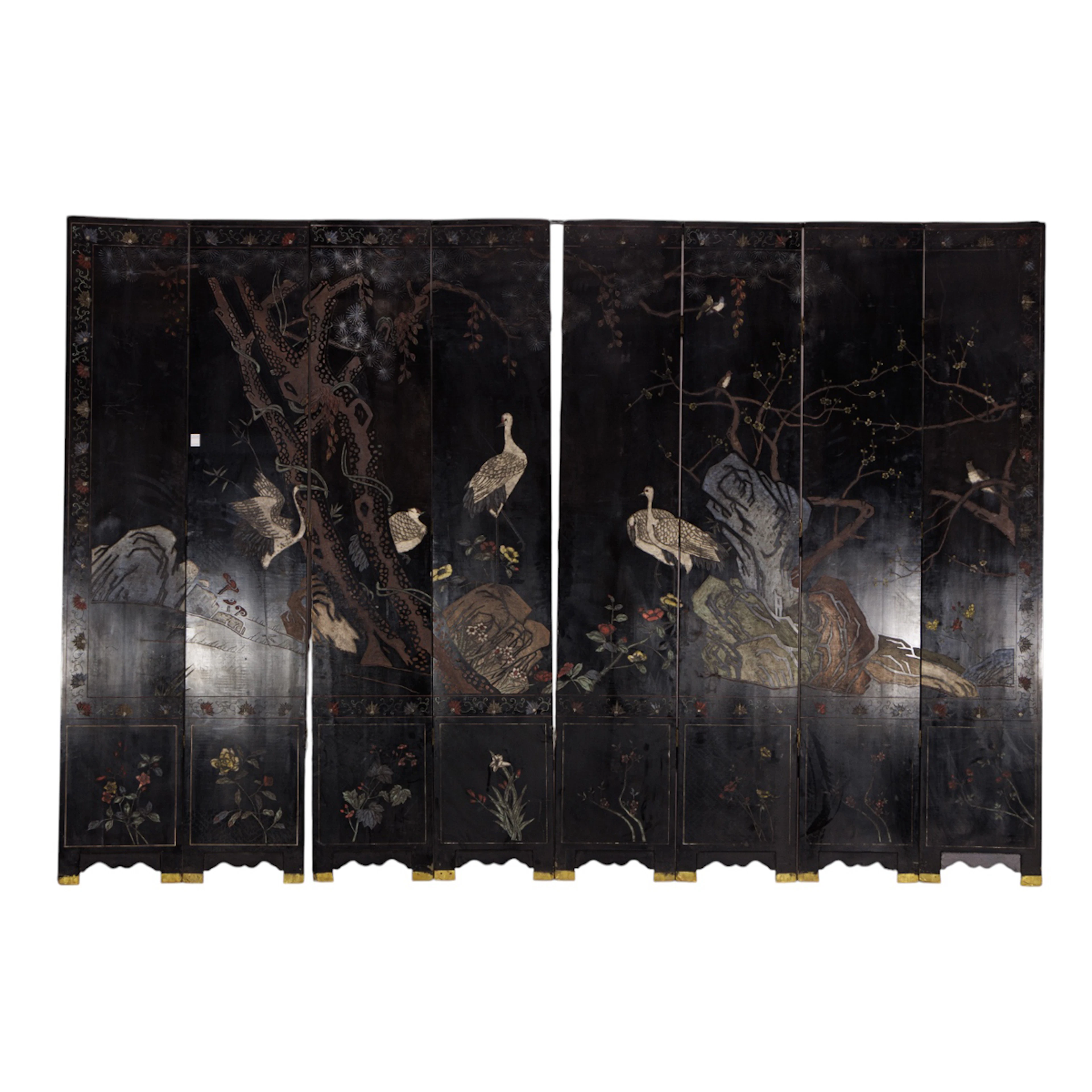 A Chinese eight-panel black lacquer coromandel style folding screen