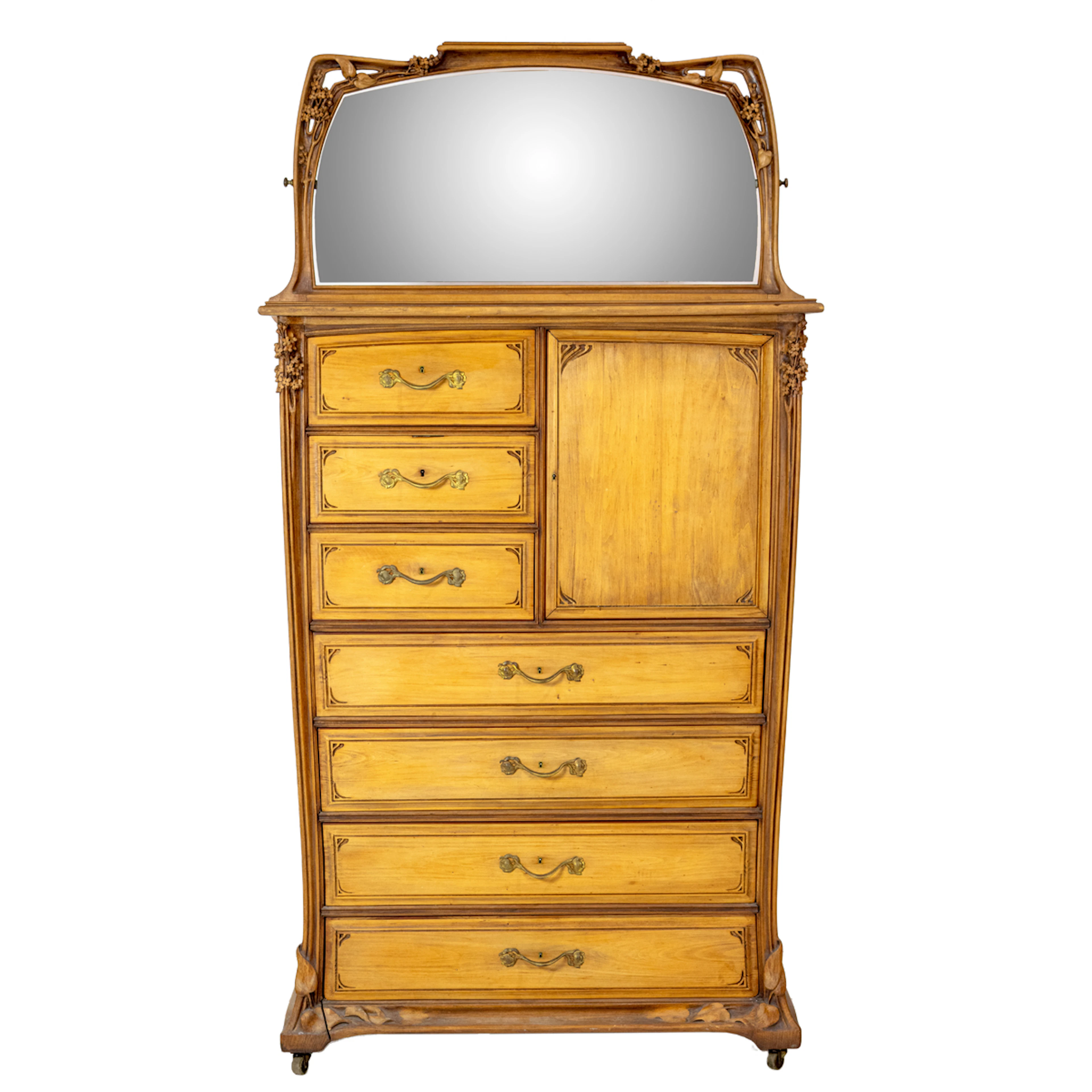 A Louis Majorelle (1859-1926) Art Nouveau standing chest with mirror