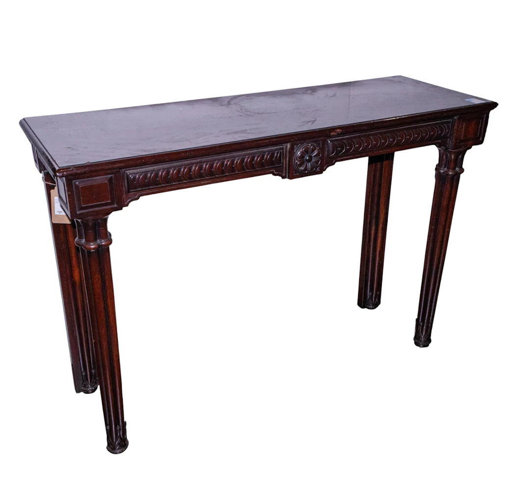 An English mahogany console table in the Gothic Revival taste