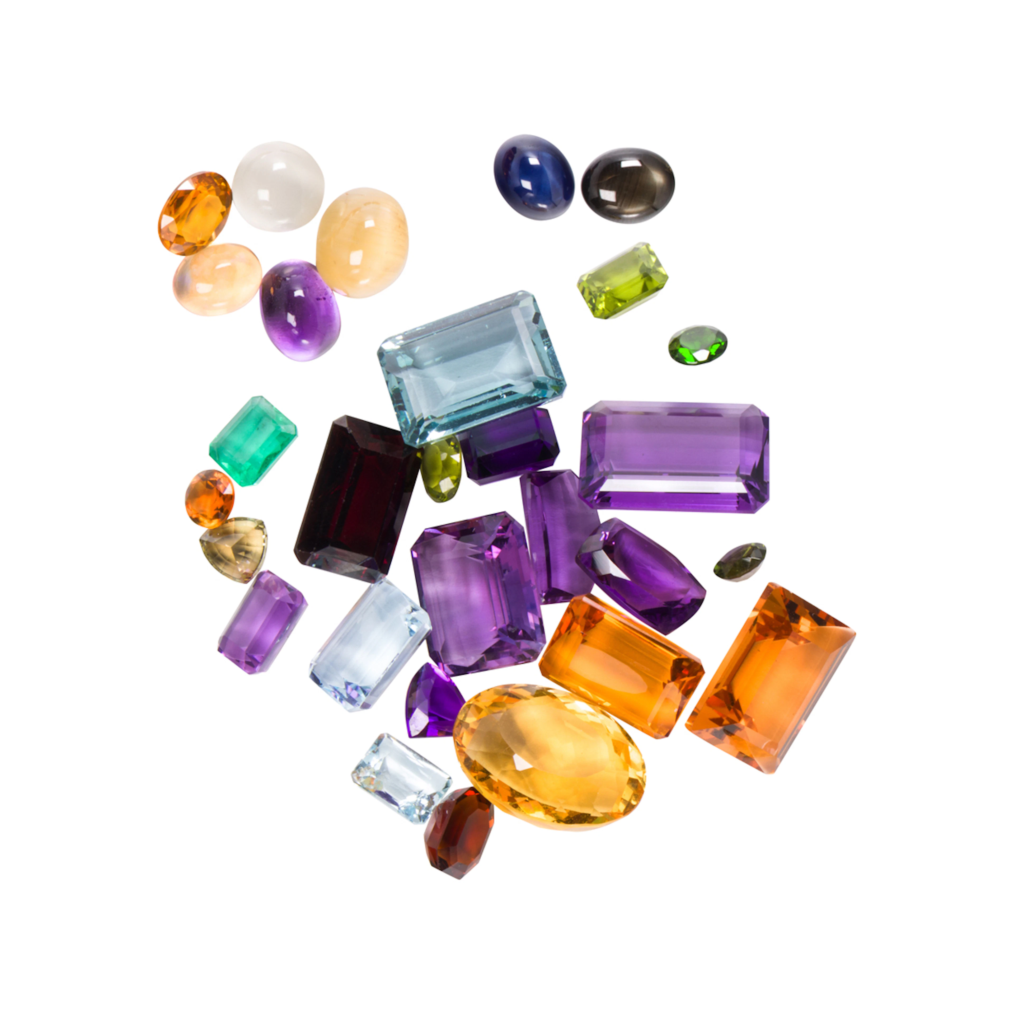 A collection of unmounted gemstones