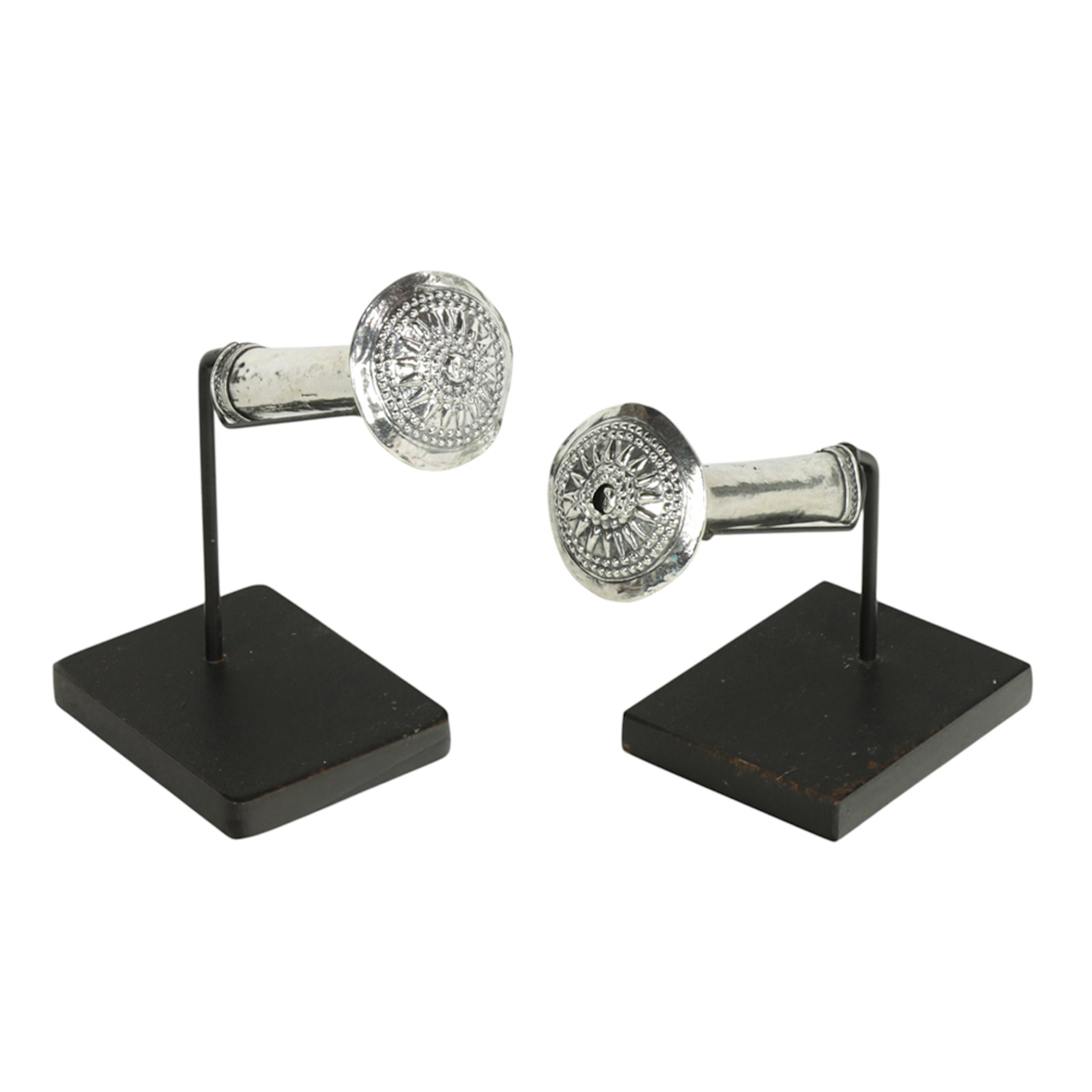 A pair of Southeast Asian silver tribal earrings