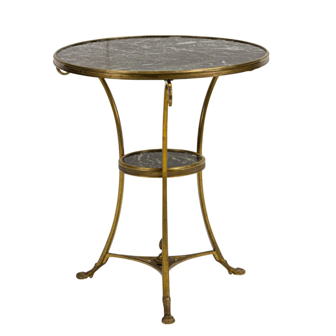 An Empire style gilt bronze mounted variegated marble gueridon