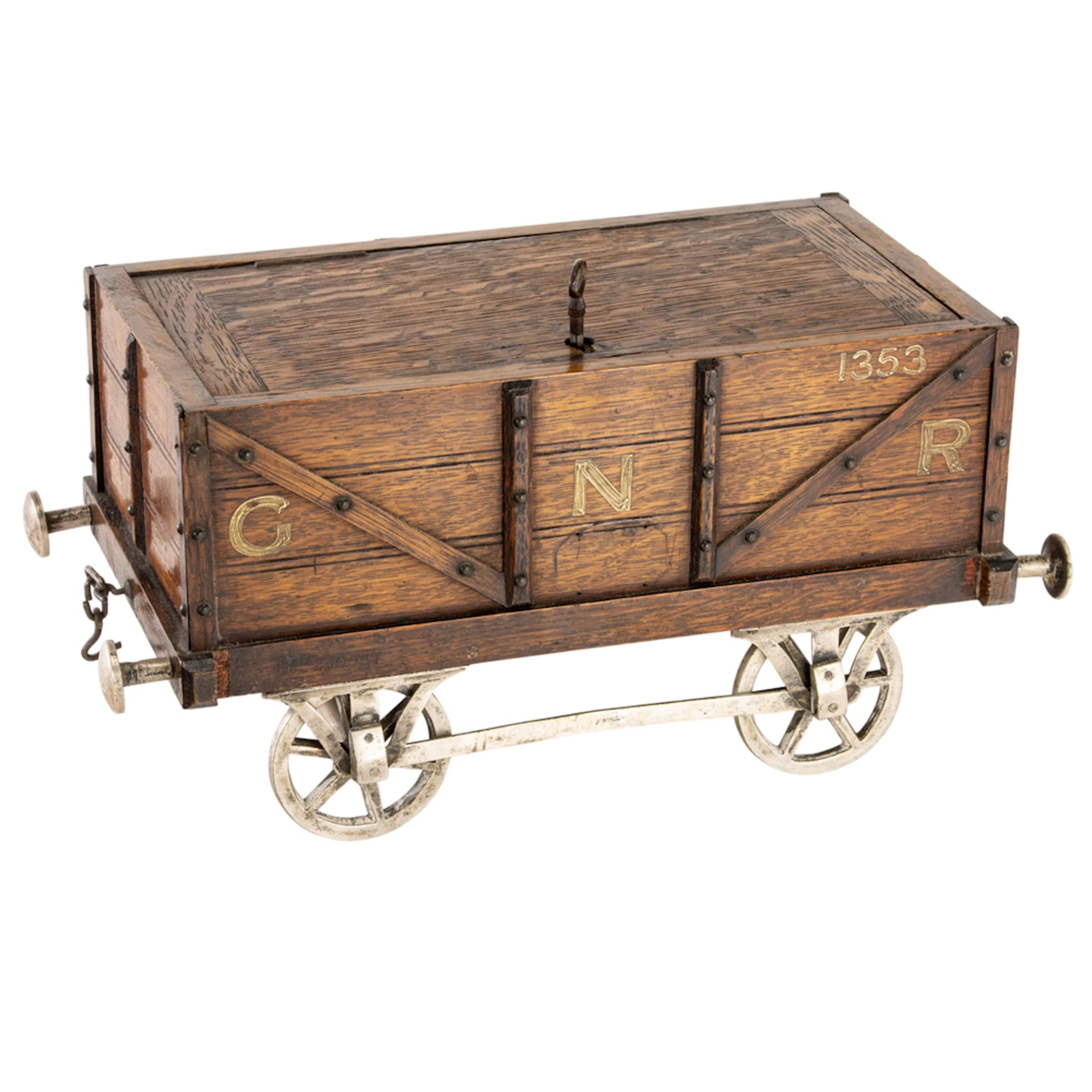 A Victorian oak novelty tobacco humidor in the form of a GNR coal car wagon