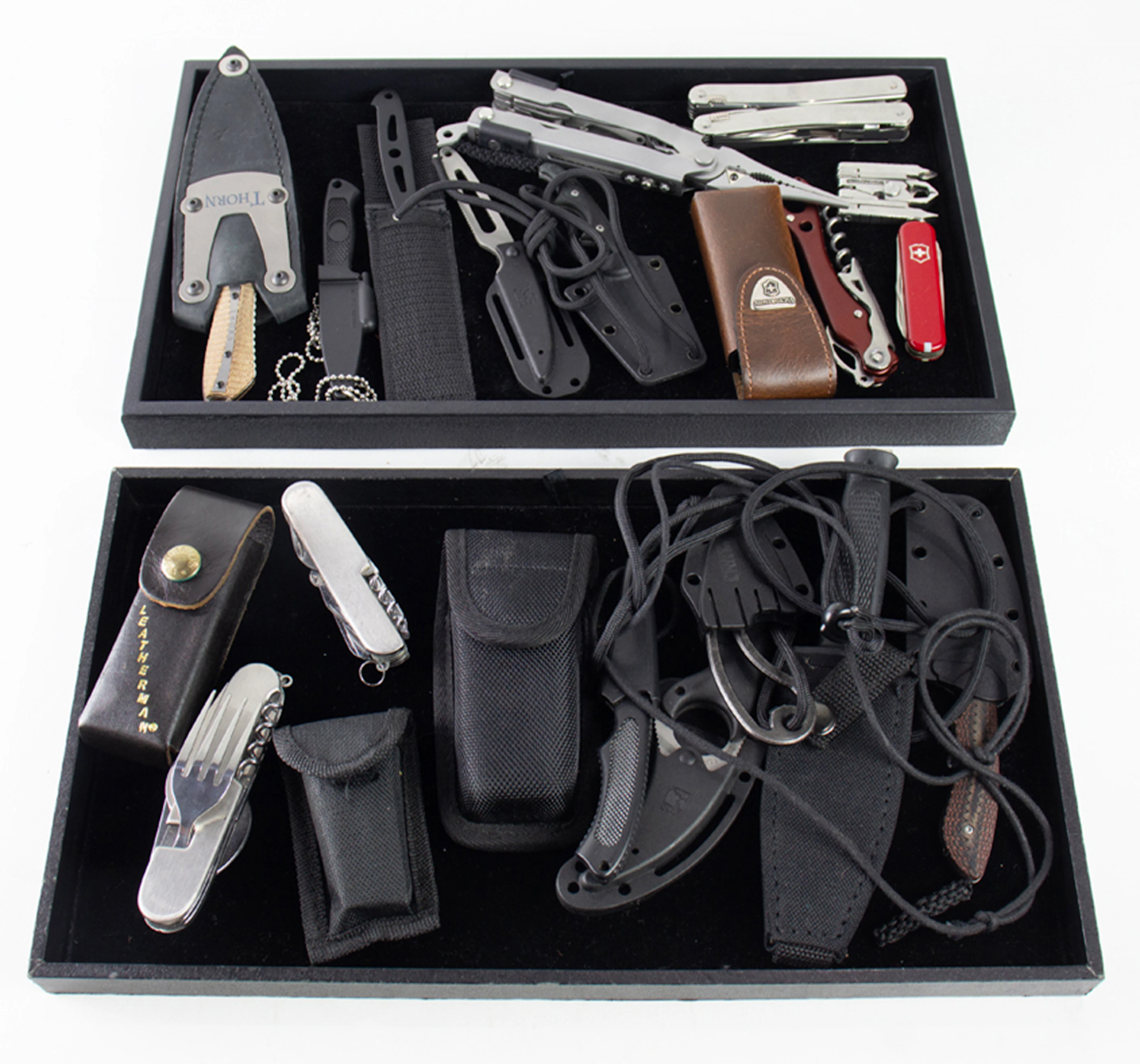 A group of ten multi-tools and ten everyday carry neck knives with sheaths