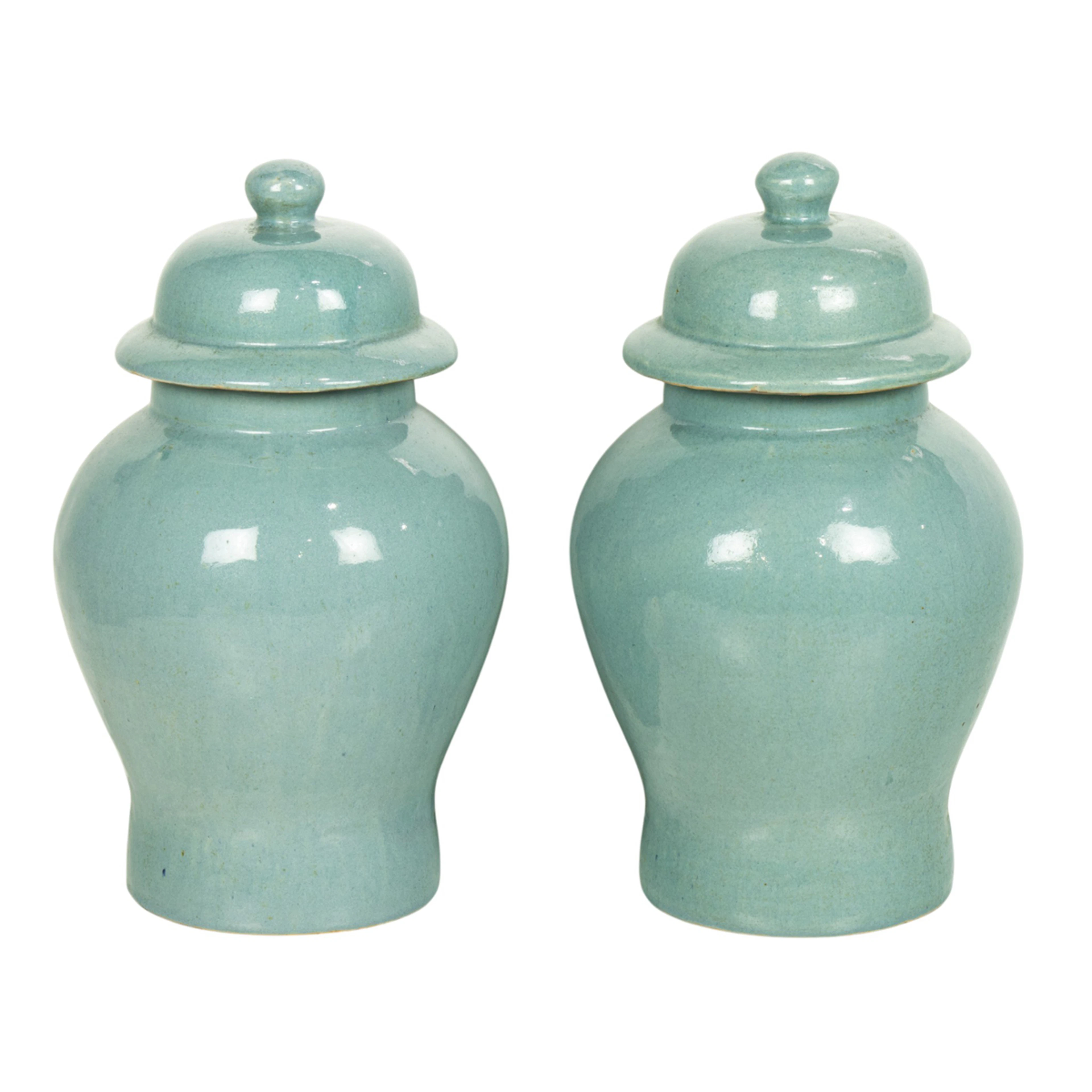 A pair of Chinese sky-blue glazed covered jars