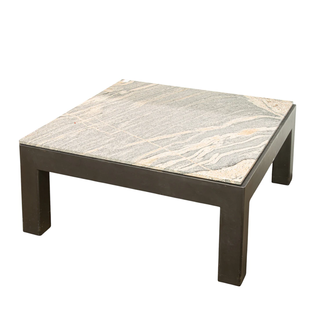 A contempoary metal coffee table with granite top