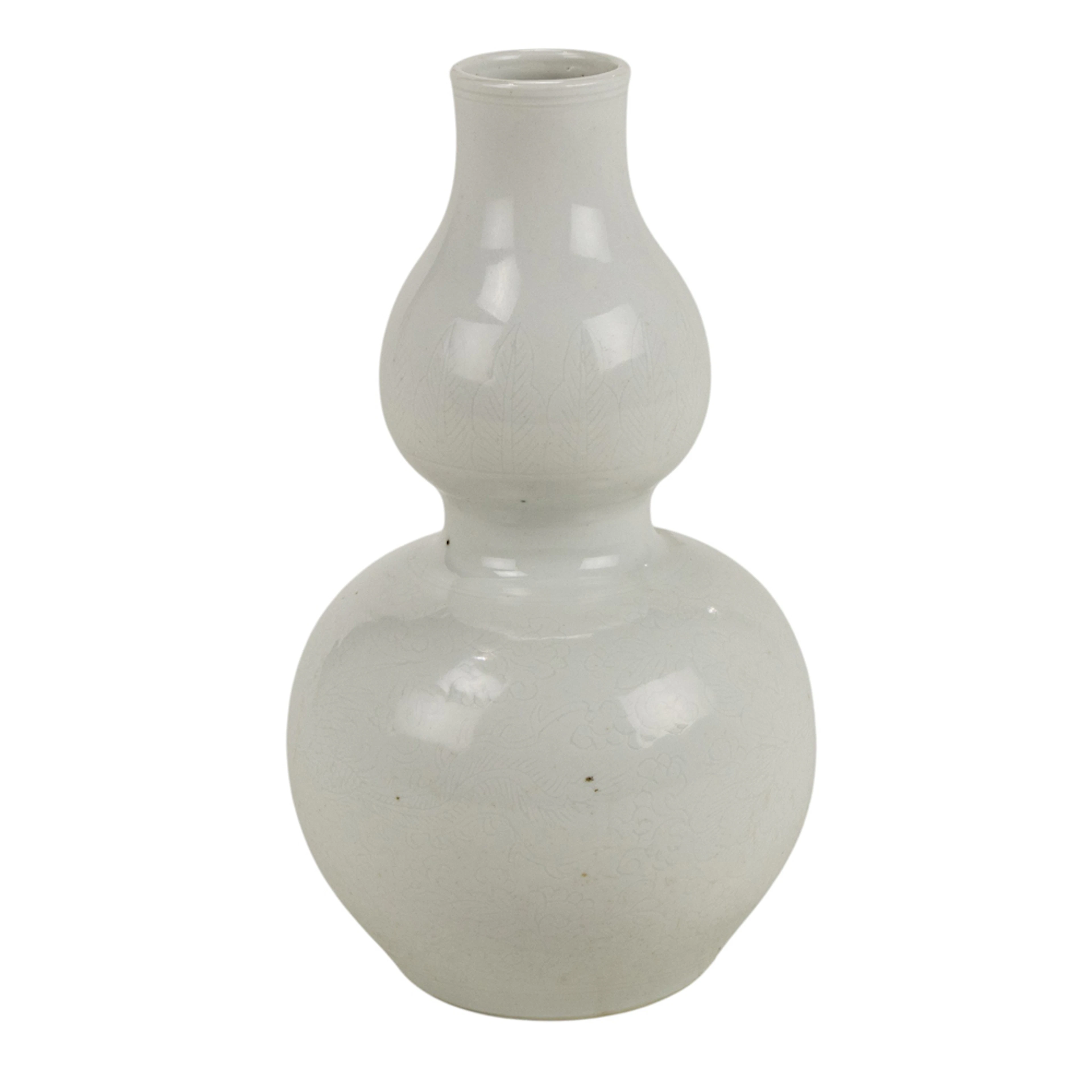 A Chinese white glazed and incised double-gourd form vase