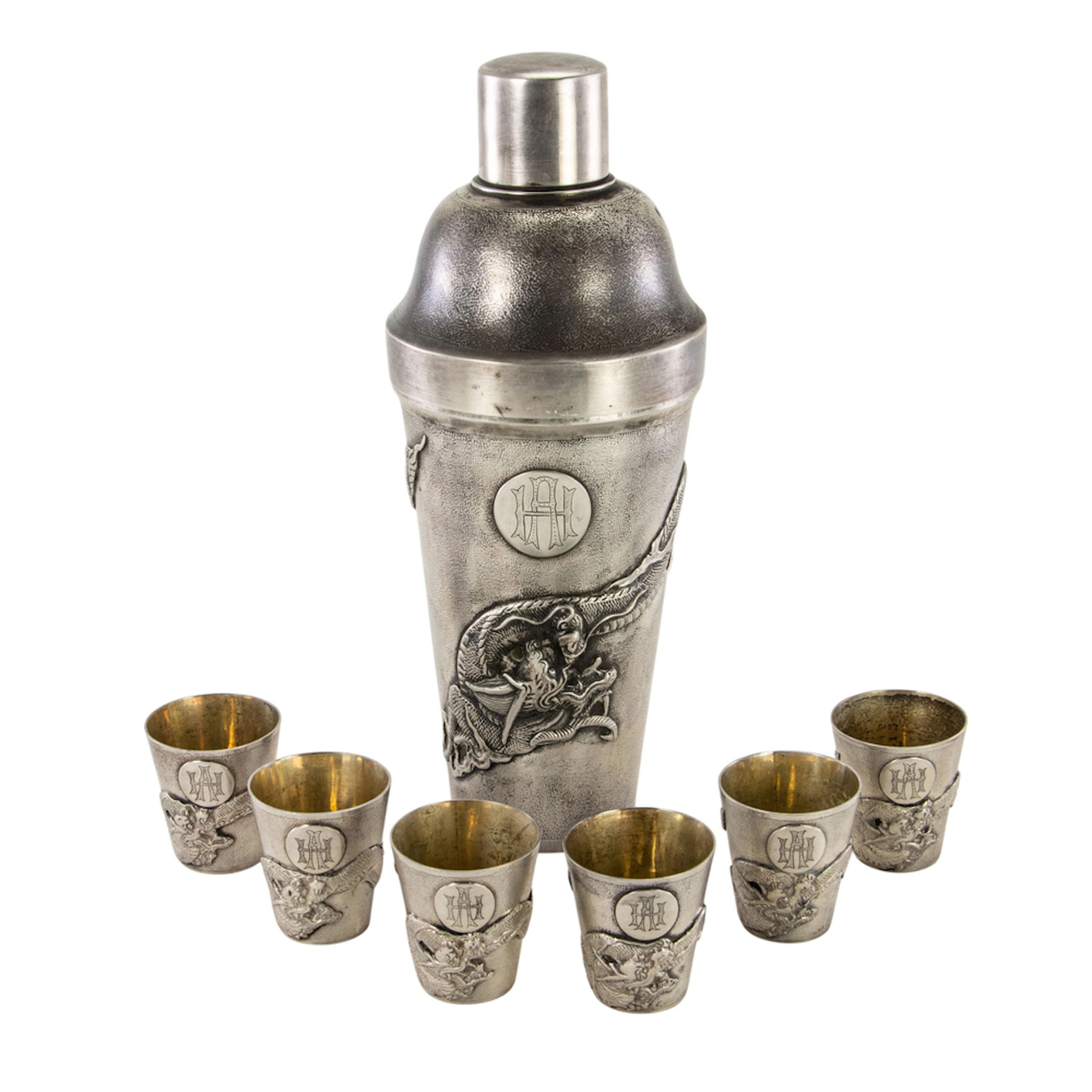 A Chinese export silver cocktail shaker with six cups