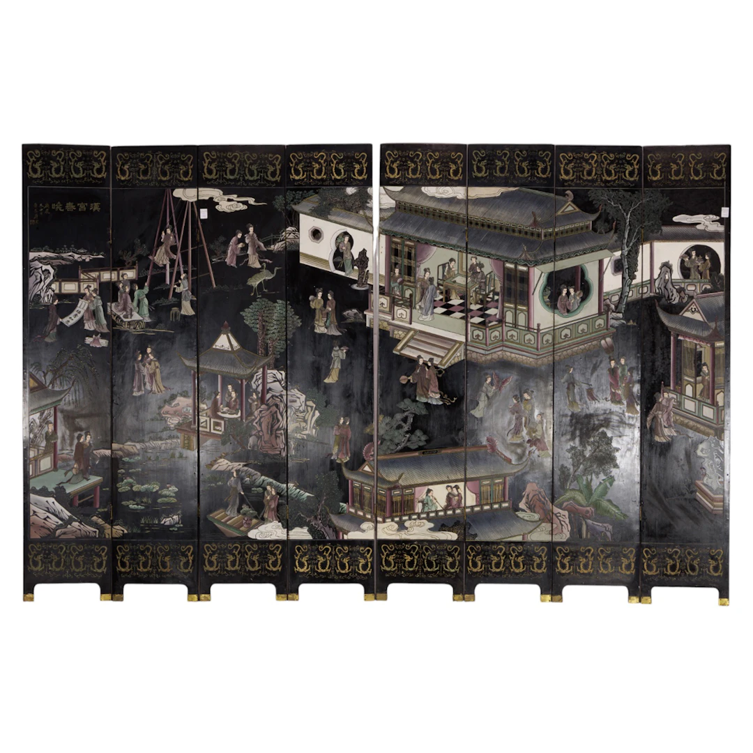 A Chinese eight-panel black lacquer coromandel style folding screen