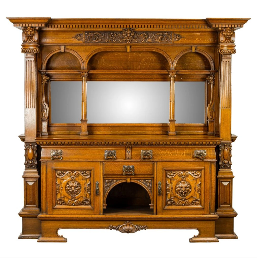 A large Victorian oak bar back or buffet in the style of R.J. Horner