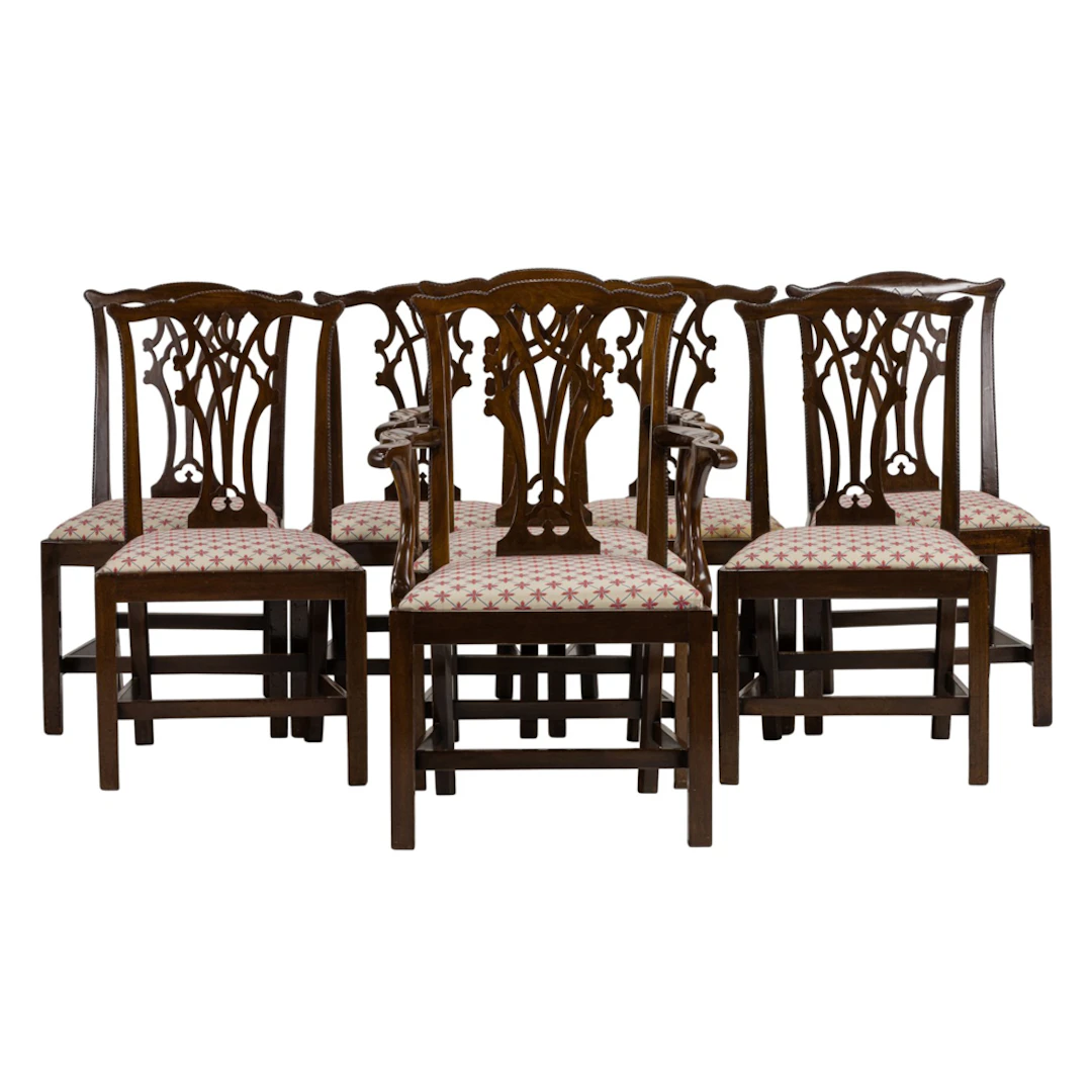 A suite of eight Chippendale style mahogany dining chairs