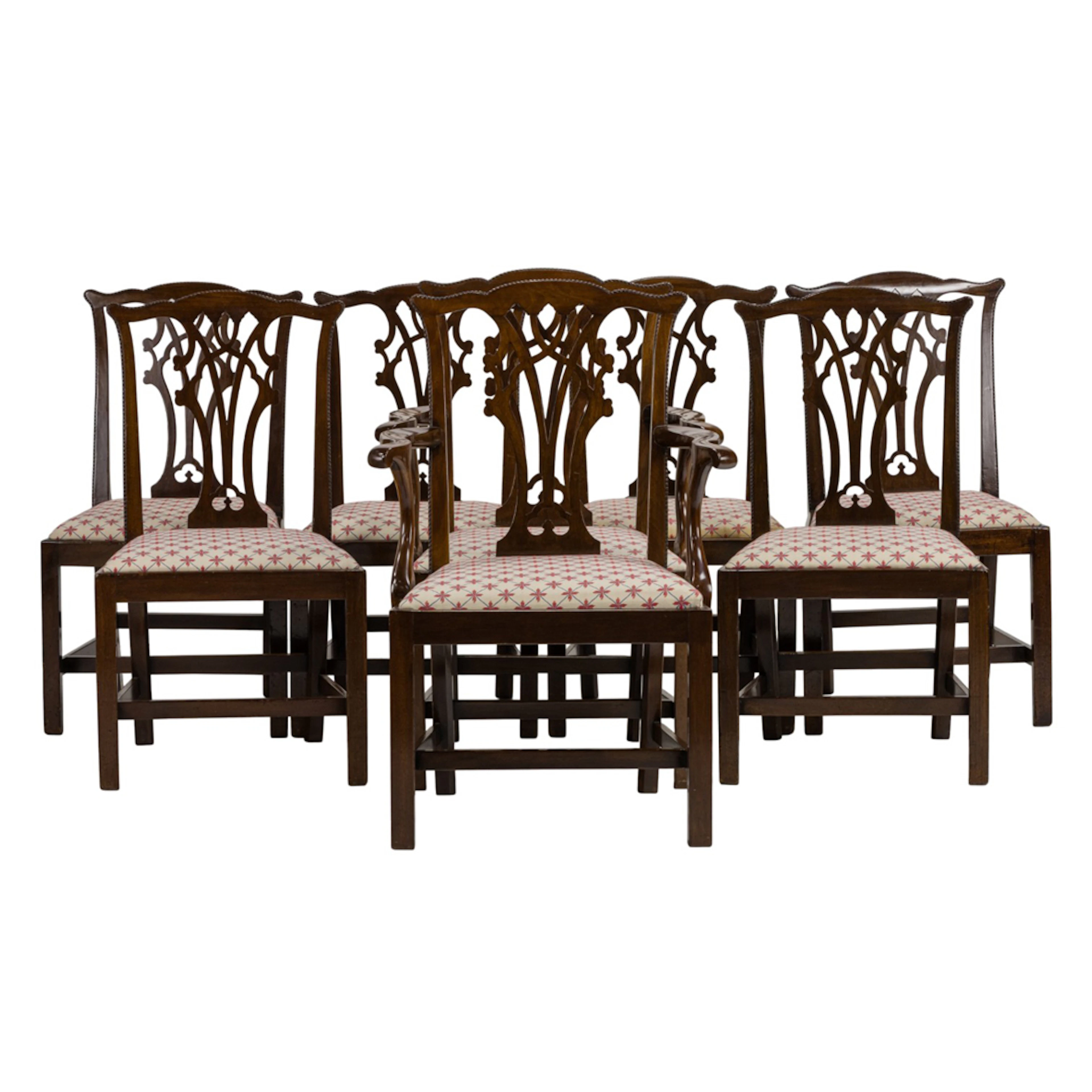 A suite of eight Chippendale style mahogany dining chairs