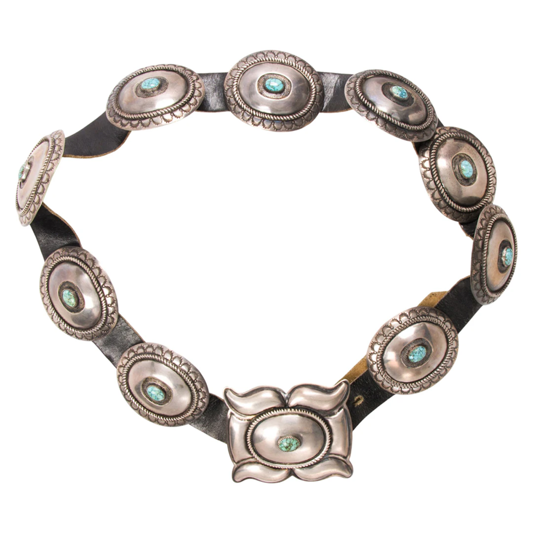 A Native American turquoise, sterling silver, and leather belt