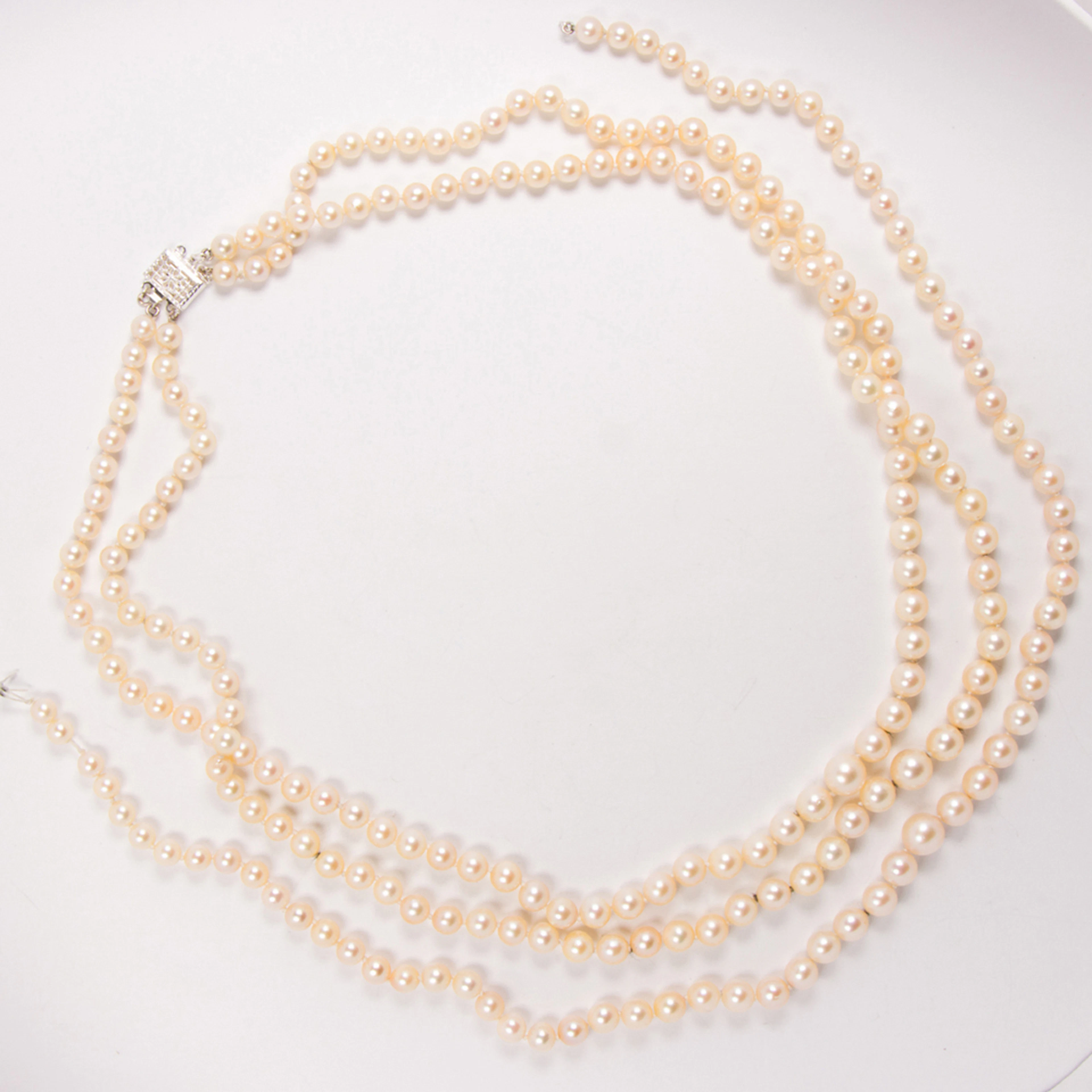 A cultured pearl and silver necklace
