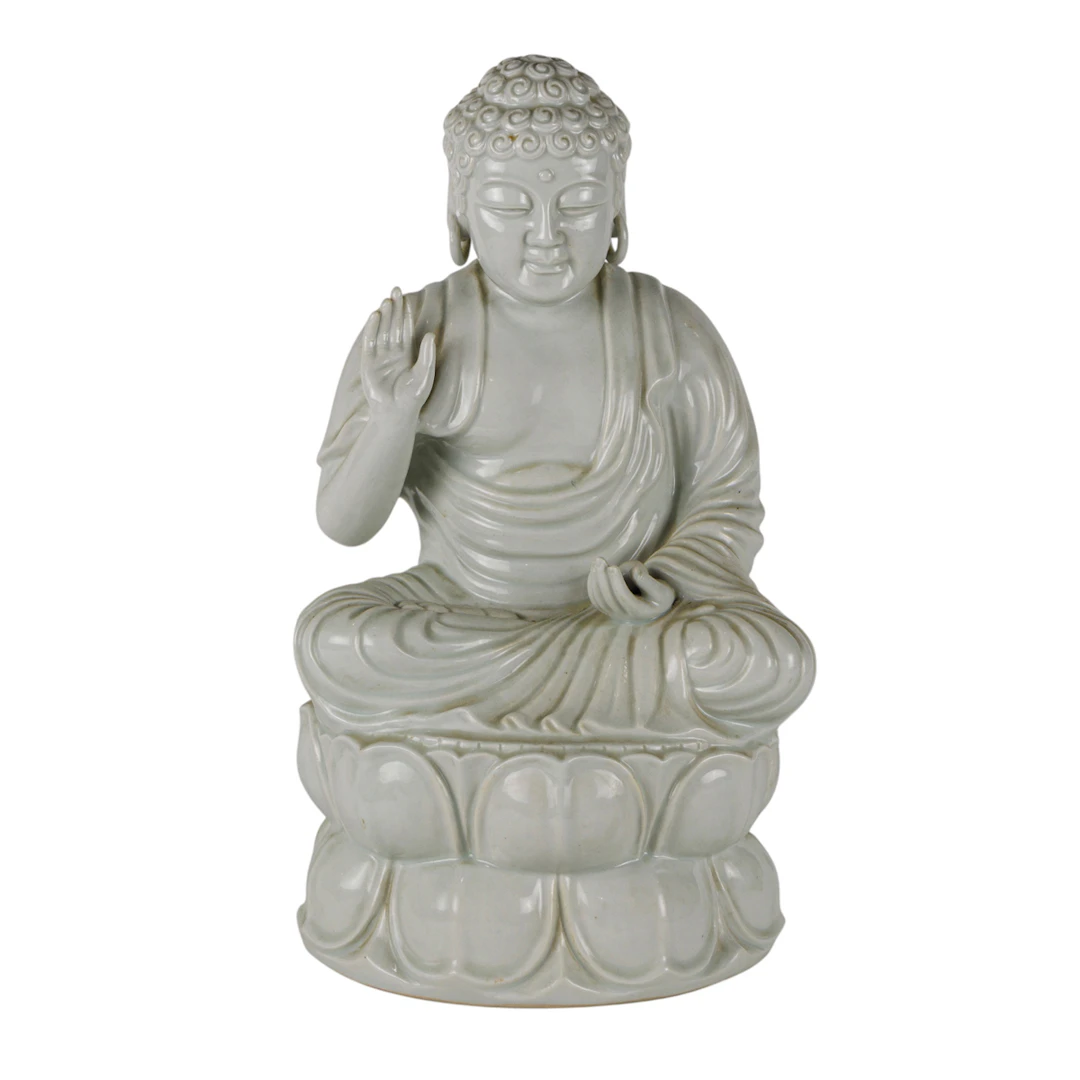 A Chinese white glazed figure of Buddha