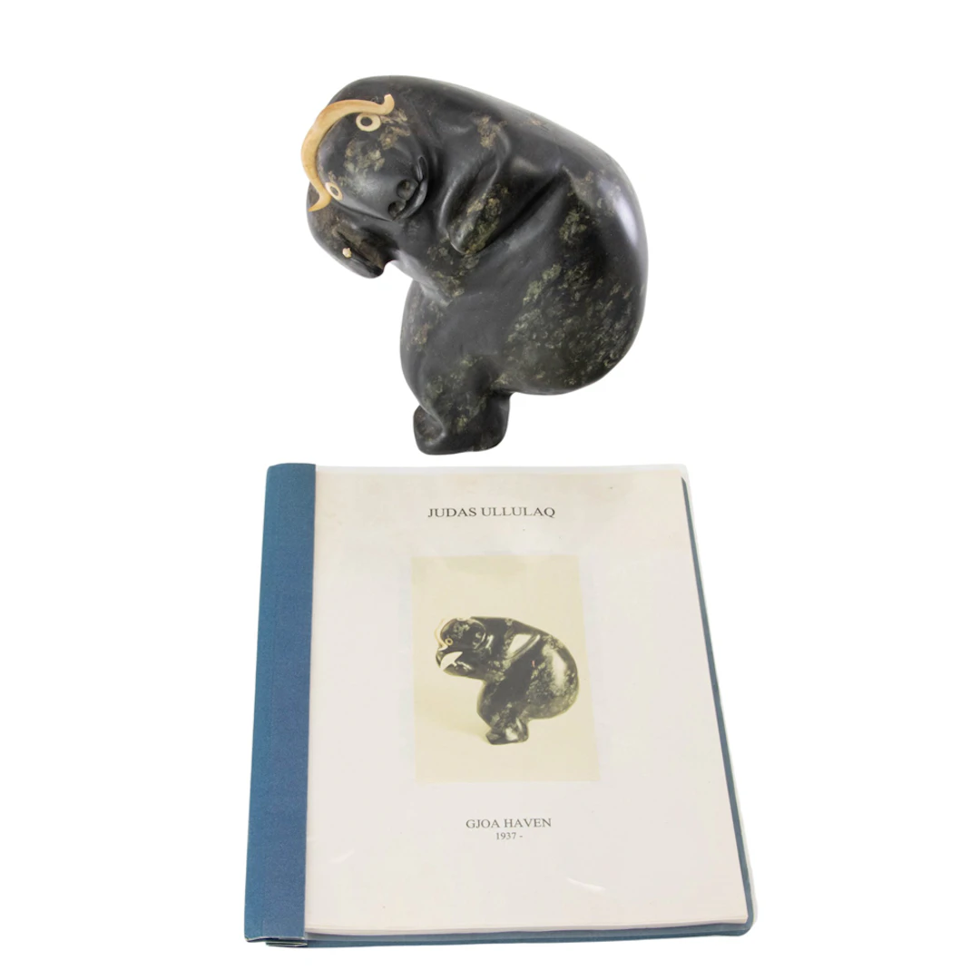 An Inuit serpentine figure of a transformation figure of a muskox
