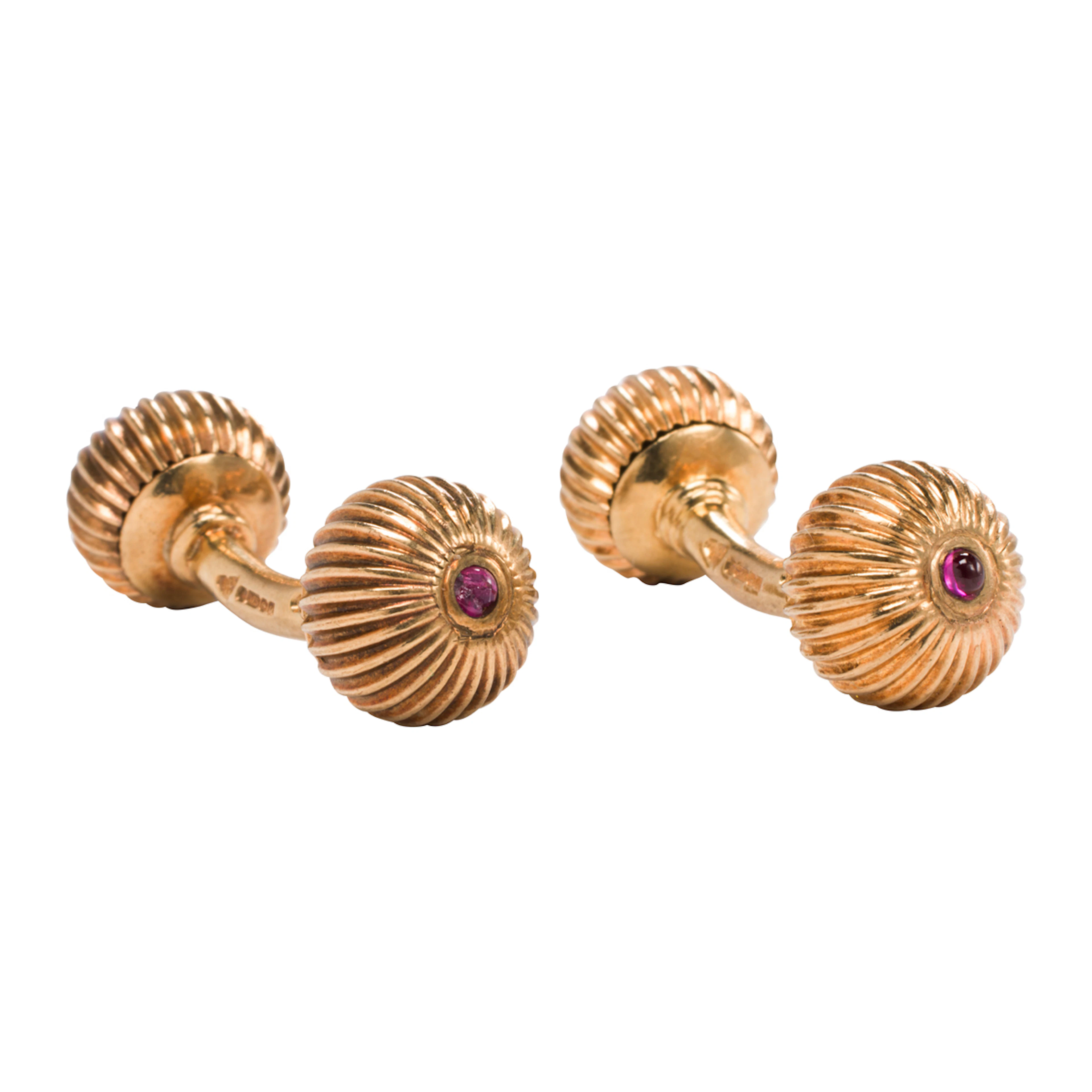 A pair of Garrard ruby and 9k gold cufflinks