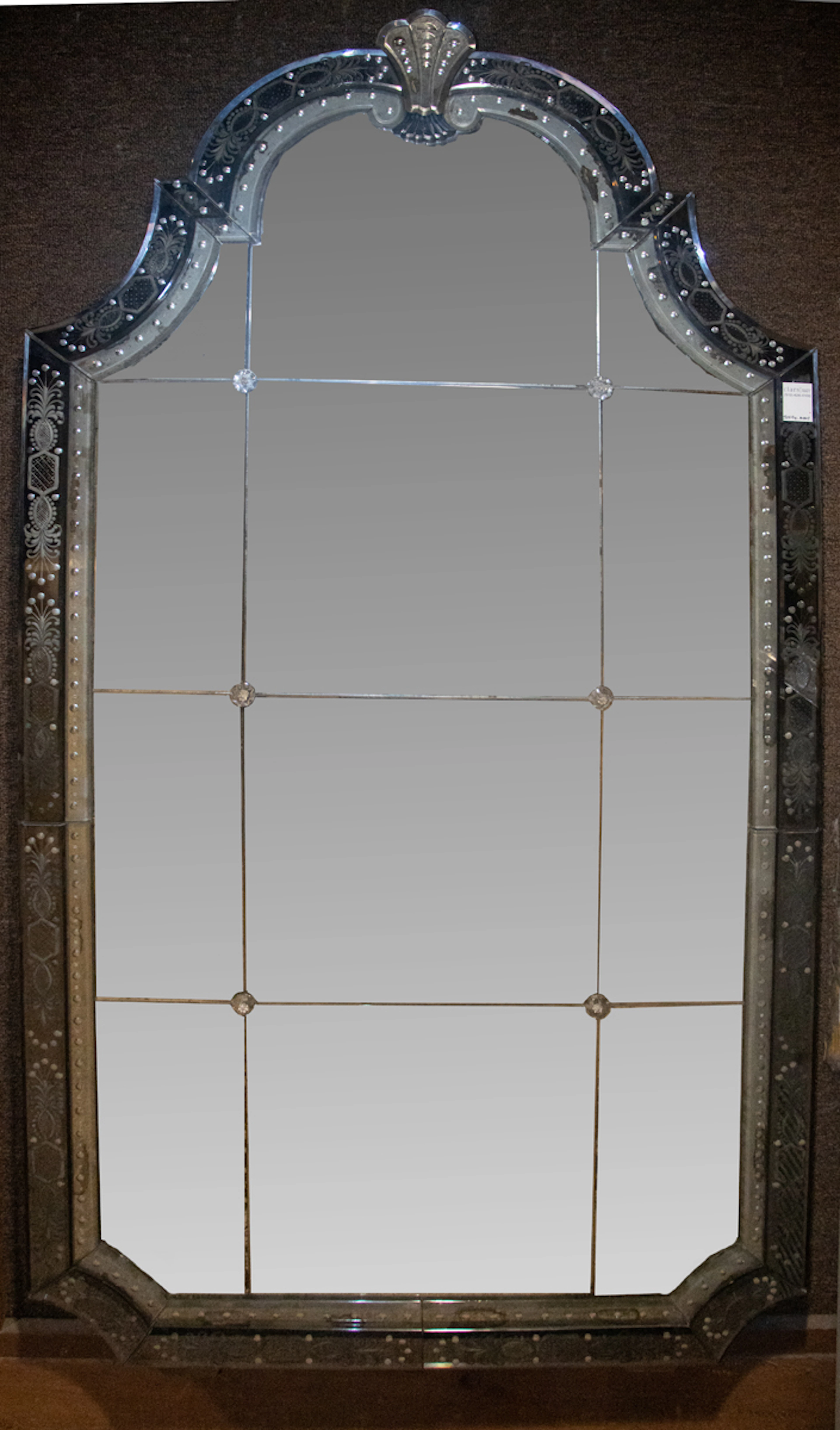 A large Venetian reverse engraved cobalt and clear glass mirror with arched top