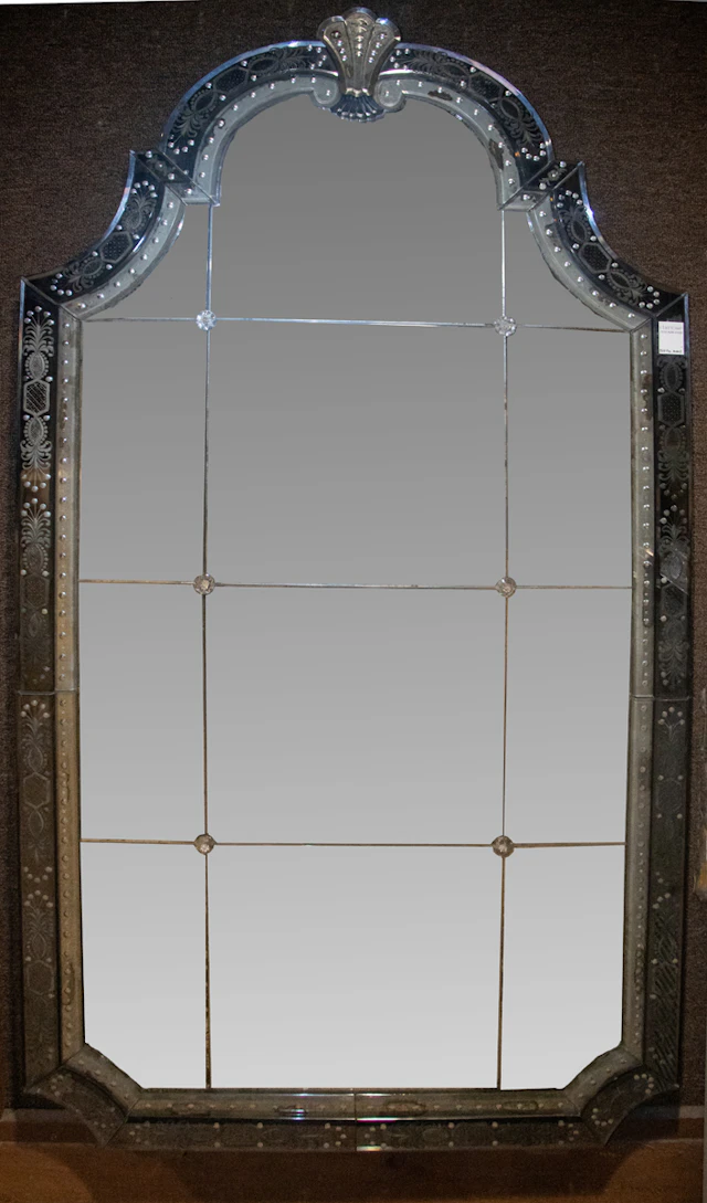 A large Venetian reverse engraved cobalt and clear glass mirror with arched top