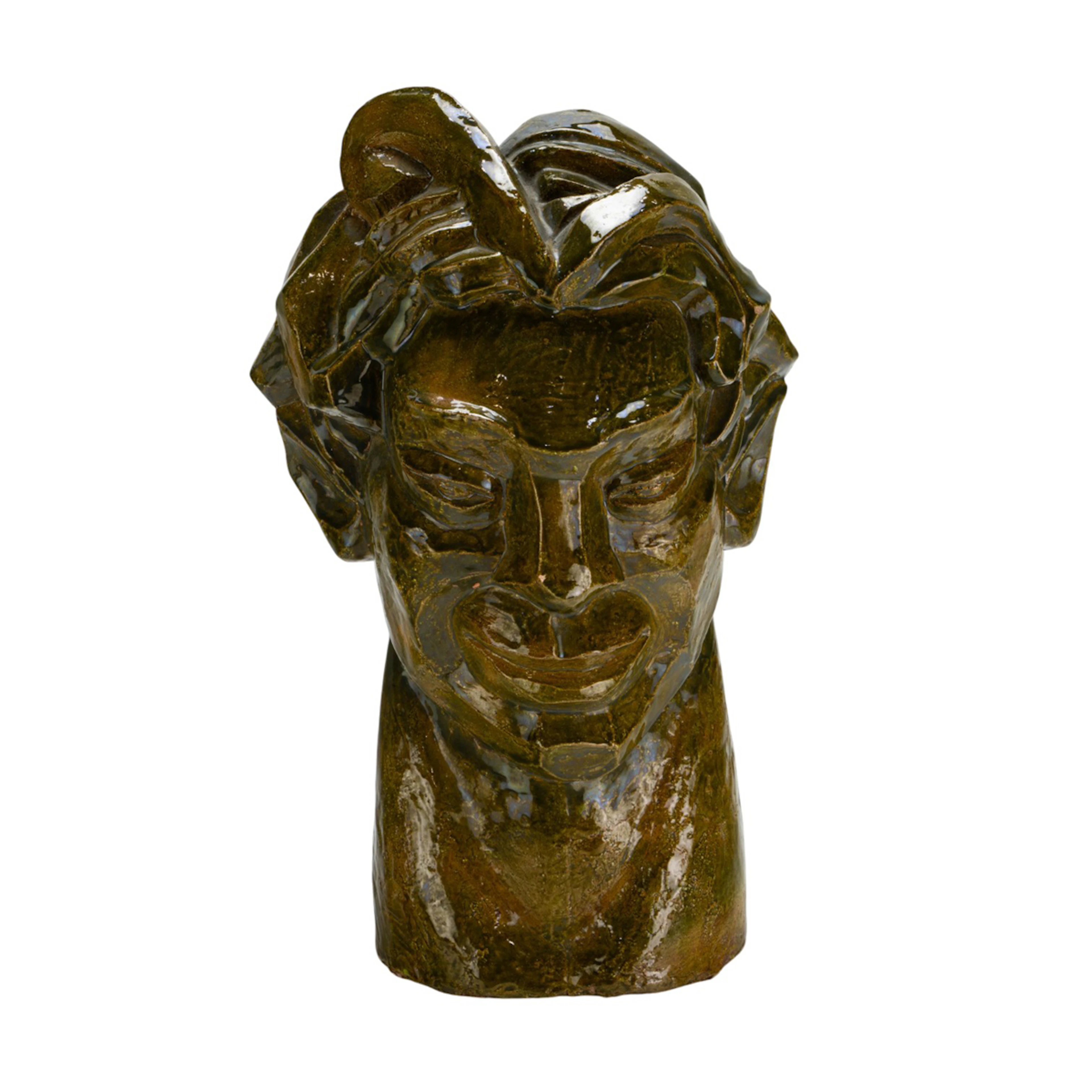 A glazed terracotta head of a satyr in the Cubist style