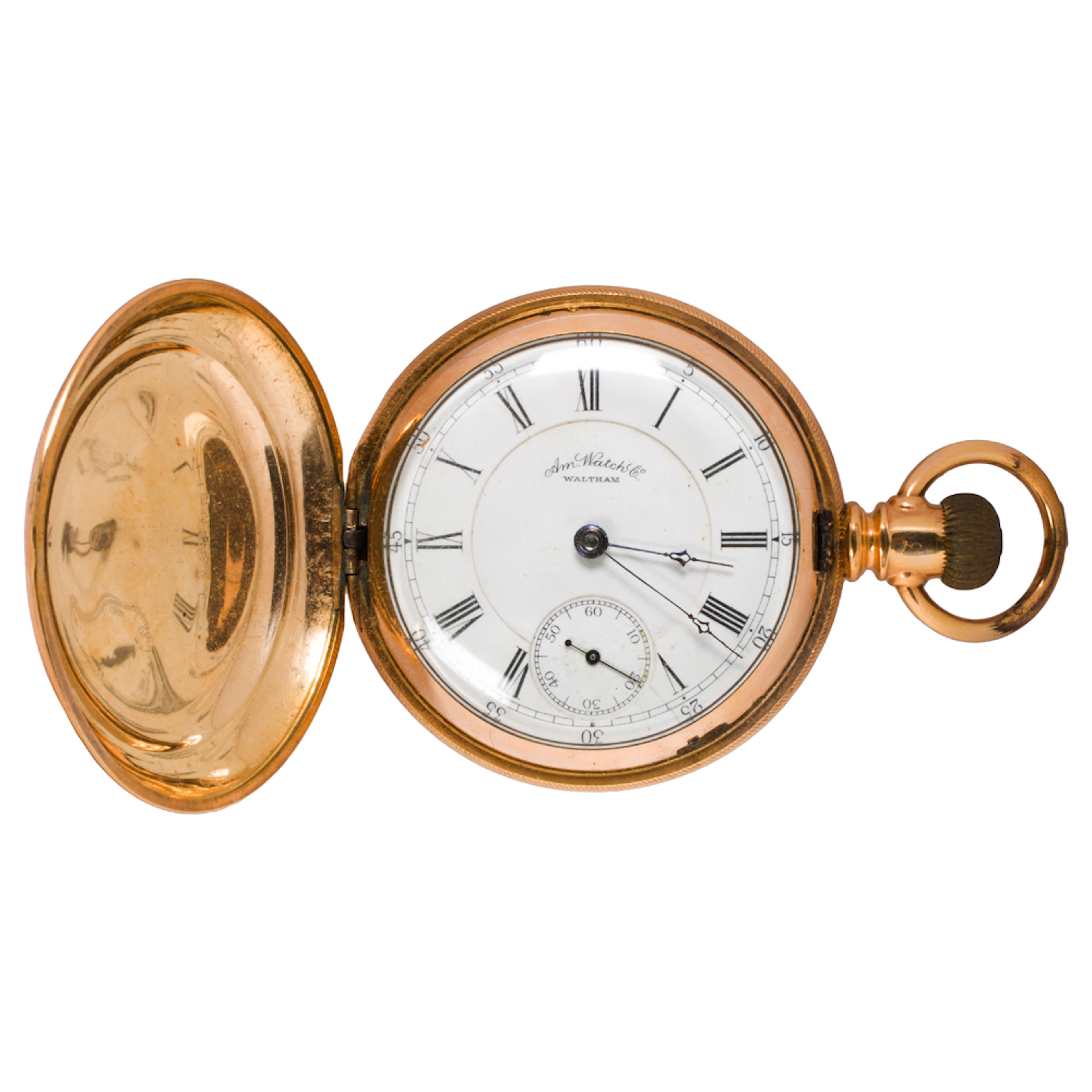 An antique Waltham pocket watch