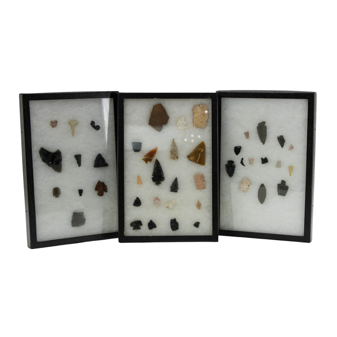 Three riker cases of arrowheads