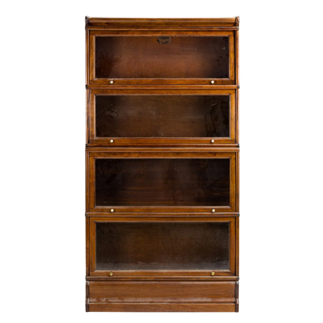 An American Arts & Crafts four-tier sectional barrister bookcase
