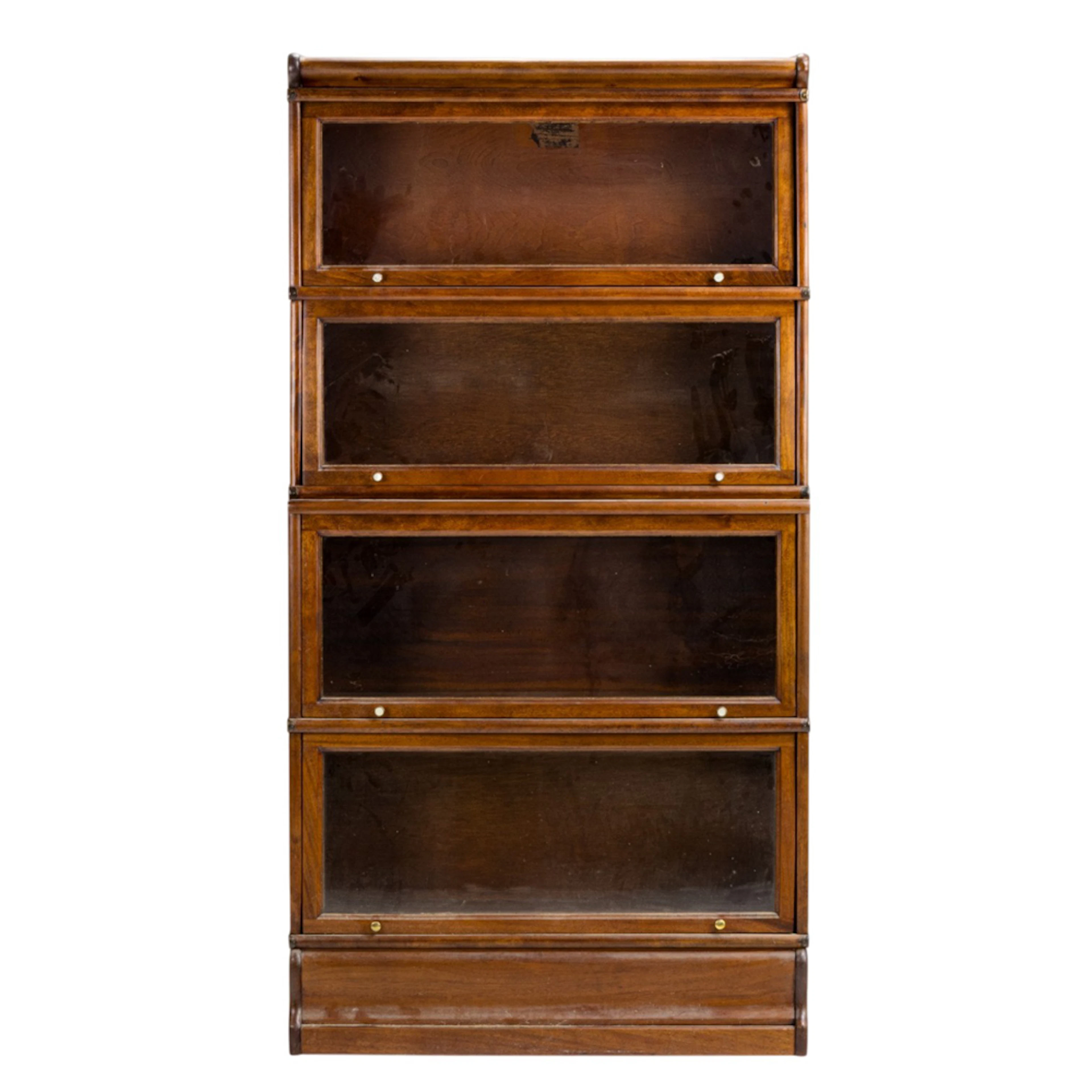 An American Arts & Crafts four-tier sectional barrister bookcase