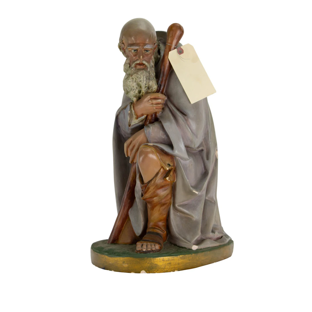 A painted creche figure of Saint Joseph