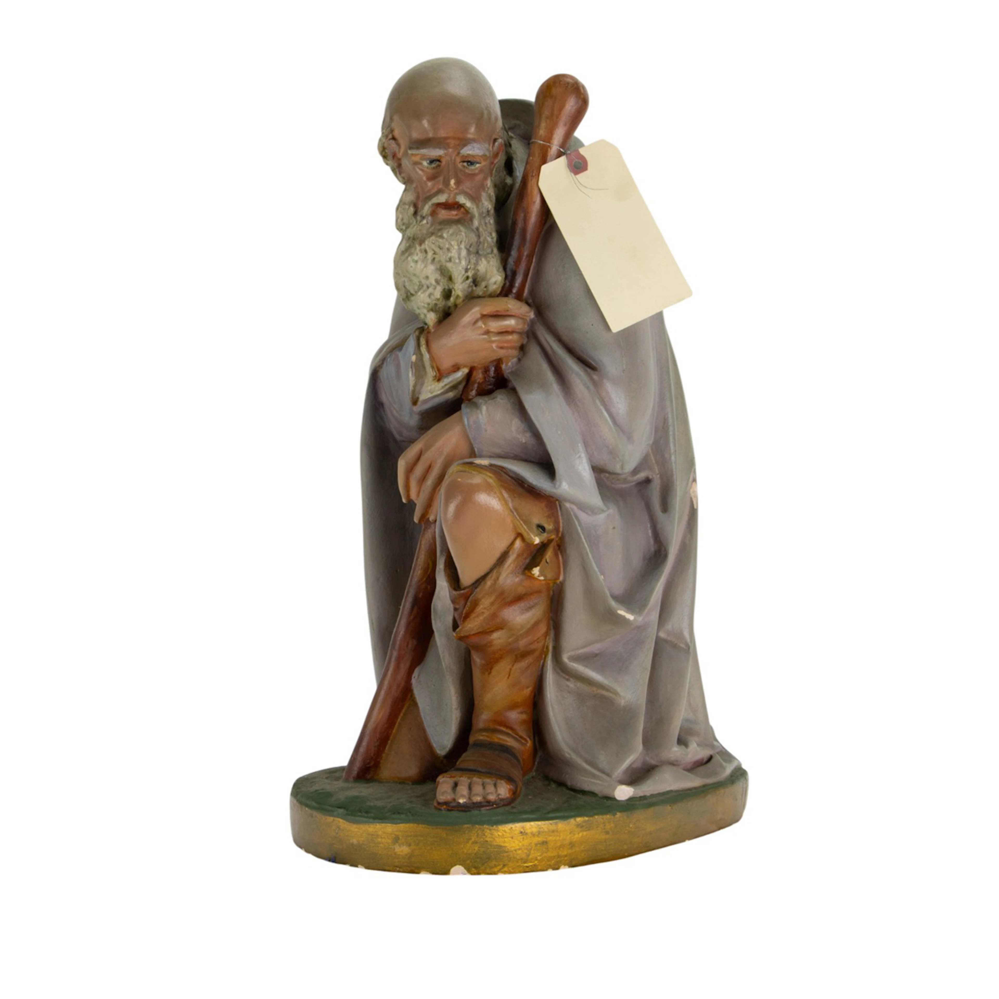 A painted creche figure of Saint Joseph