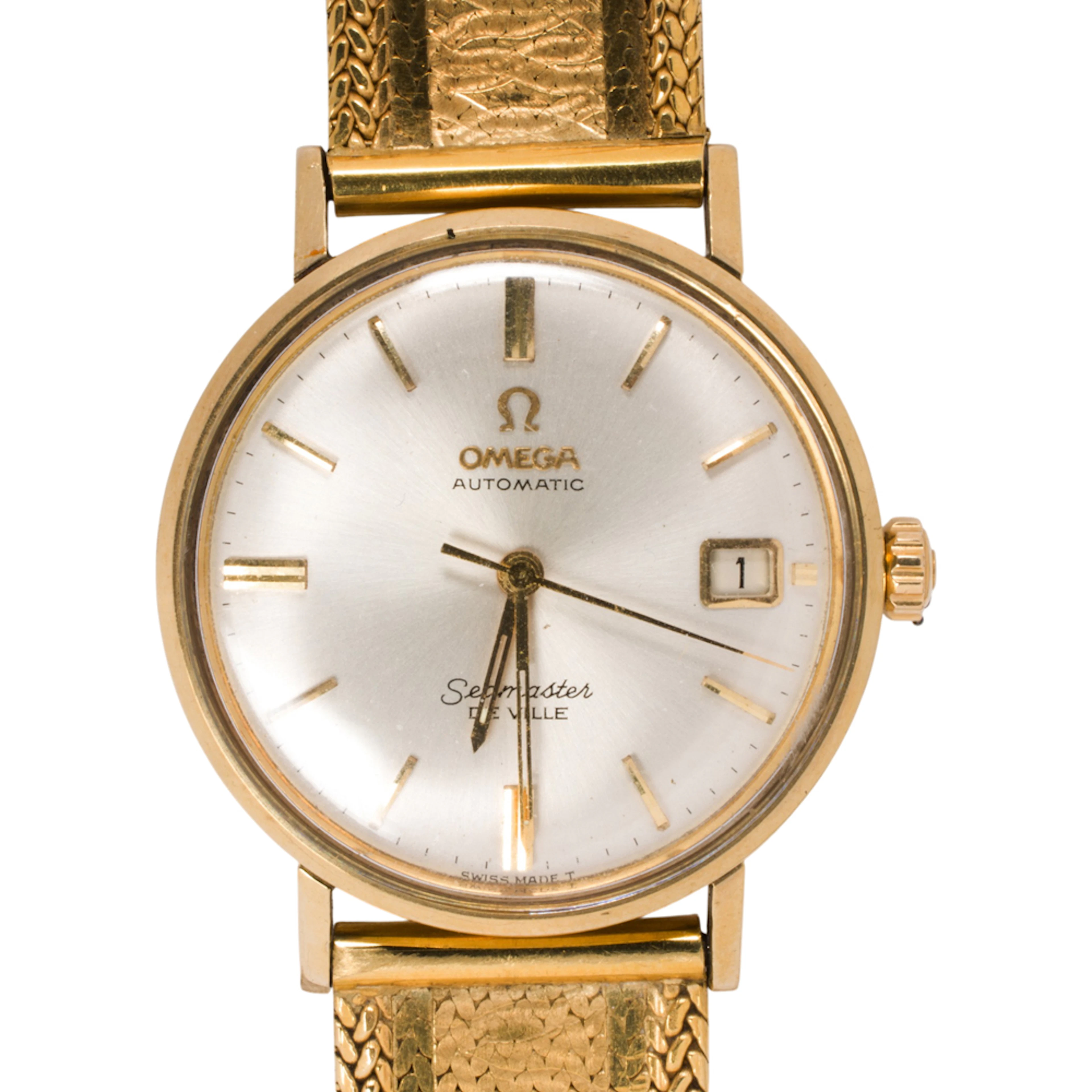 An Omega Seamaster Deville 18k gold watch