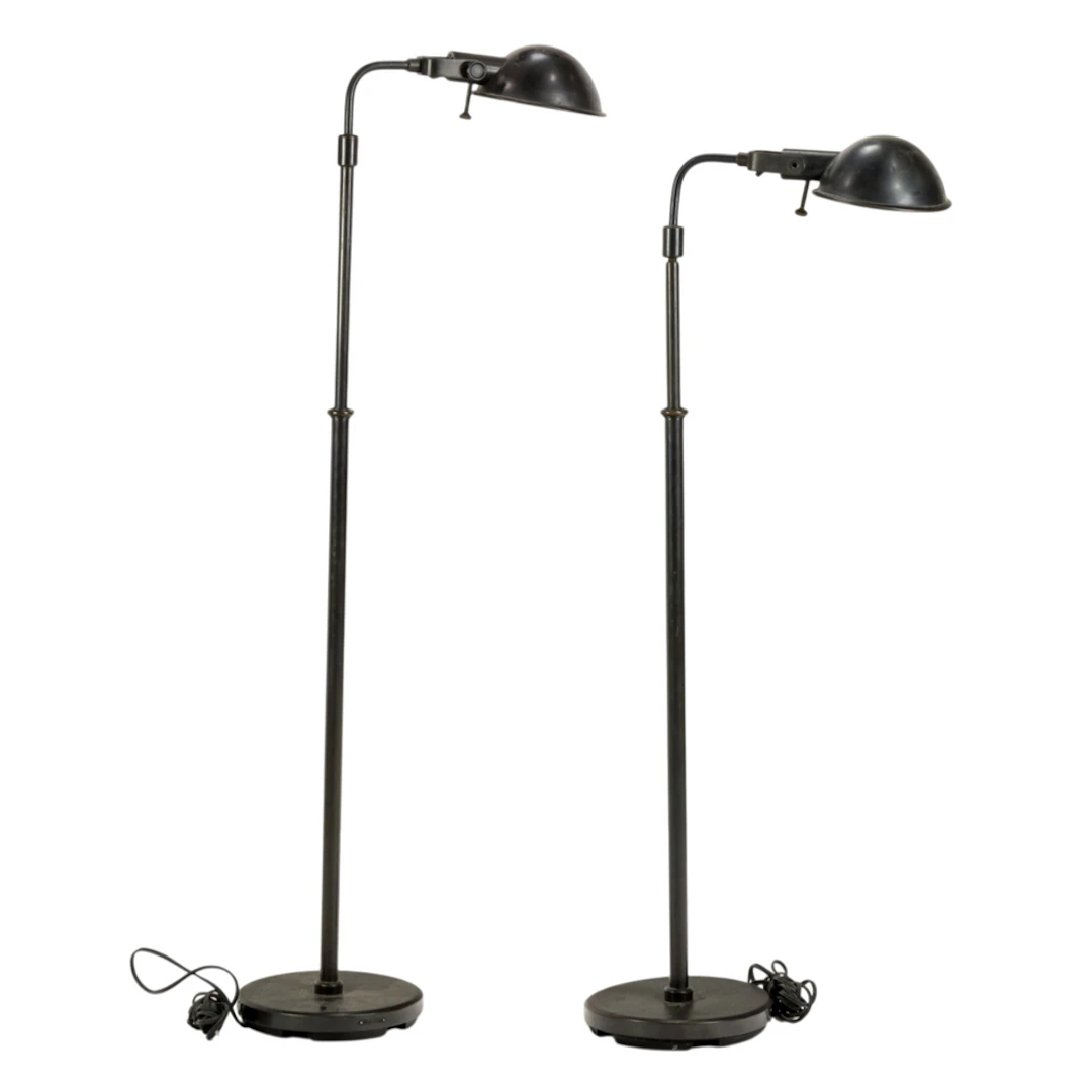 A pair of Ralph Lauren patinated bronze adjustable reading floor lamps