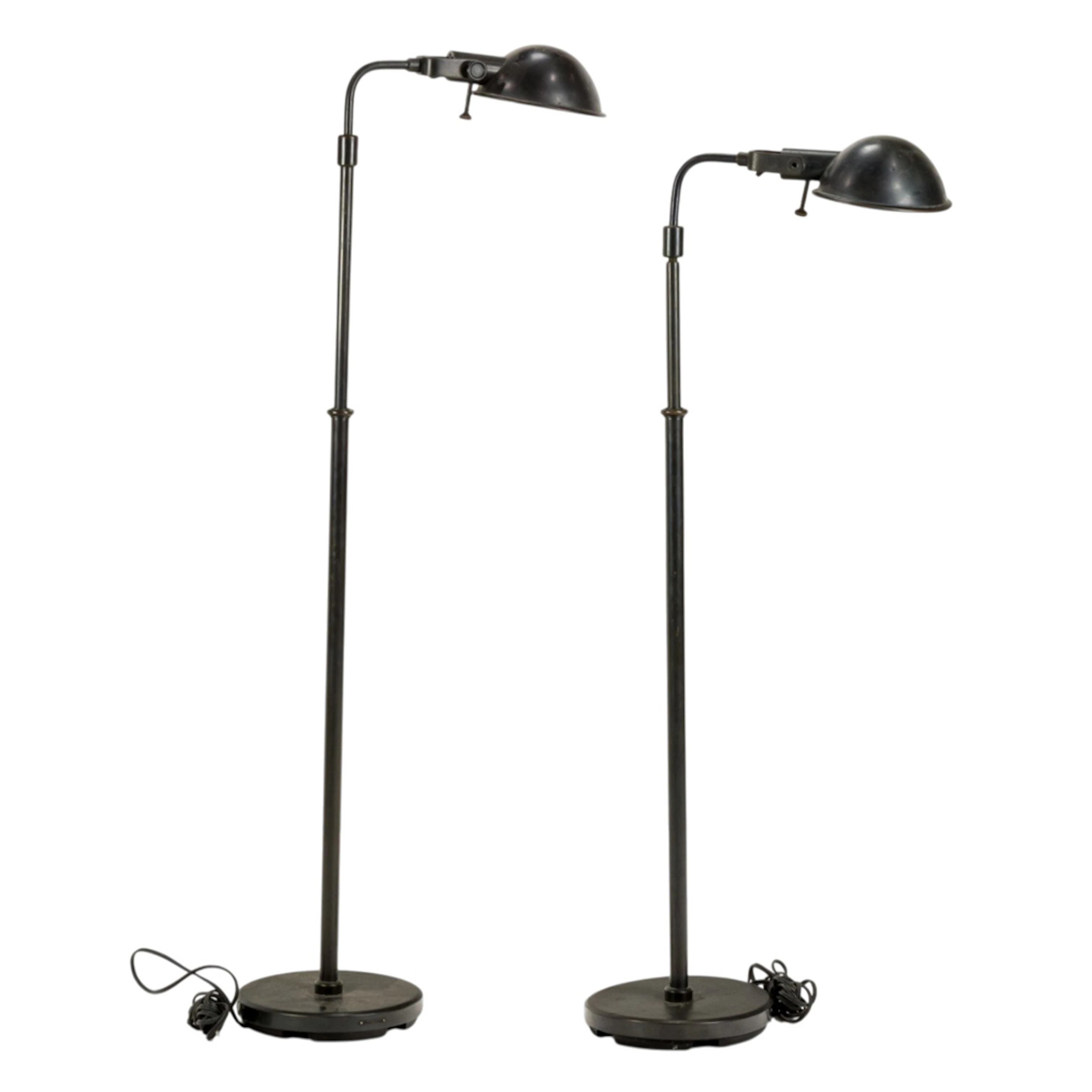 A pair of Ralph Lauren patinated bronze adjustable reading floor lamps