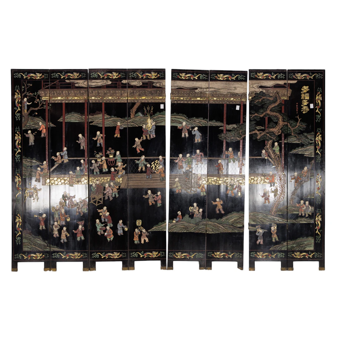 A Chinese eight-panel black lacquer coromandel style folding screen