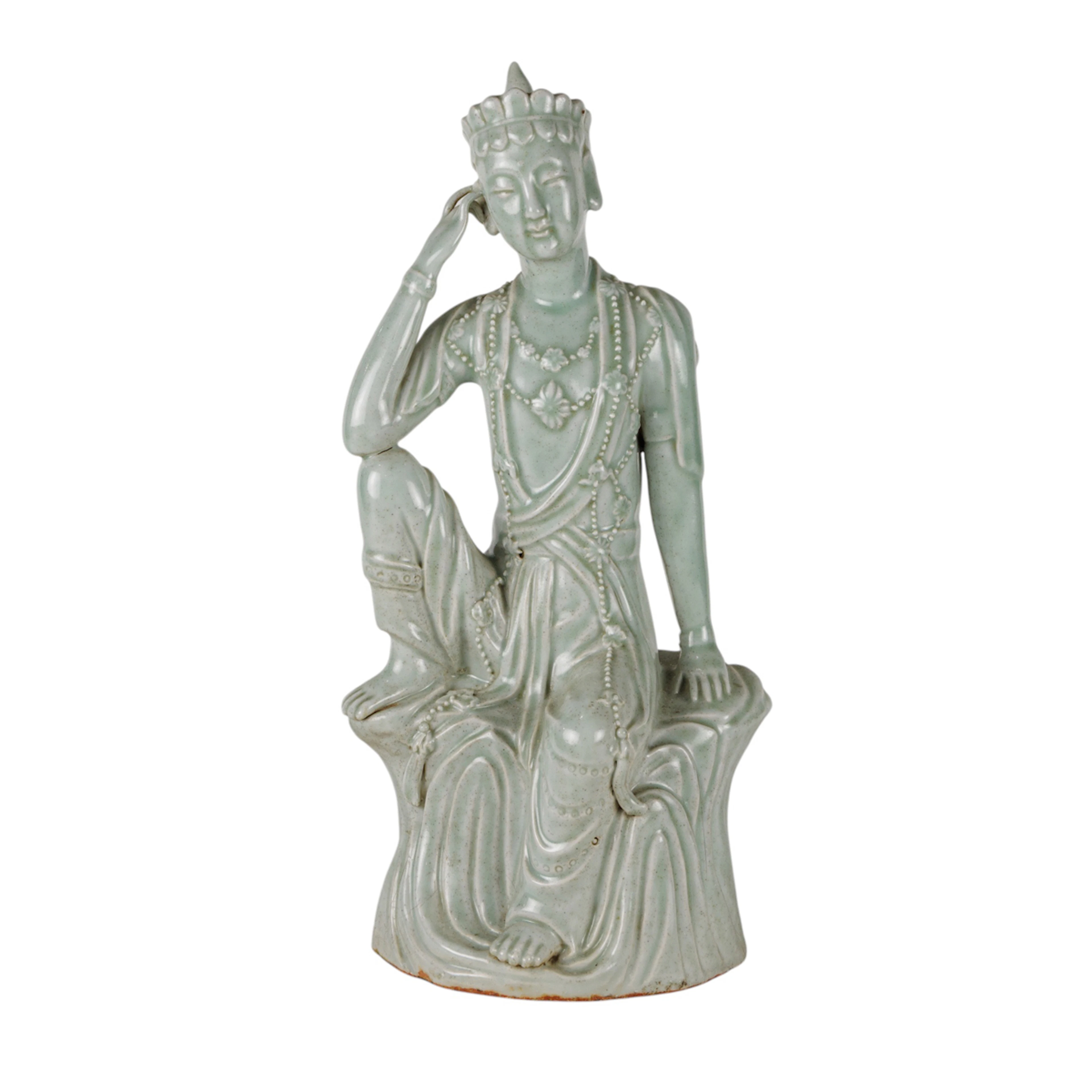 A Chinese Qingbai style glazed Buddhist figure