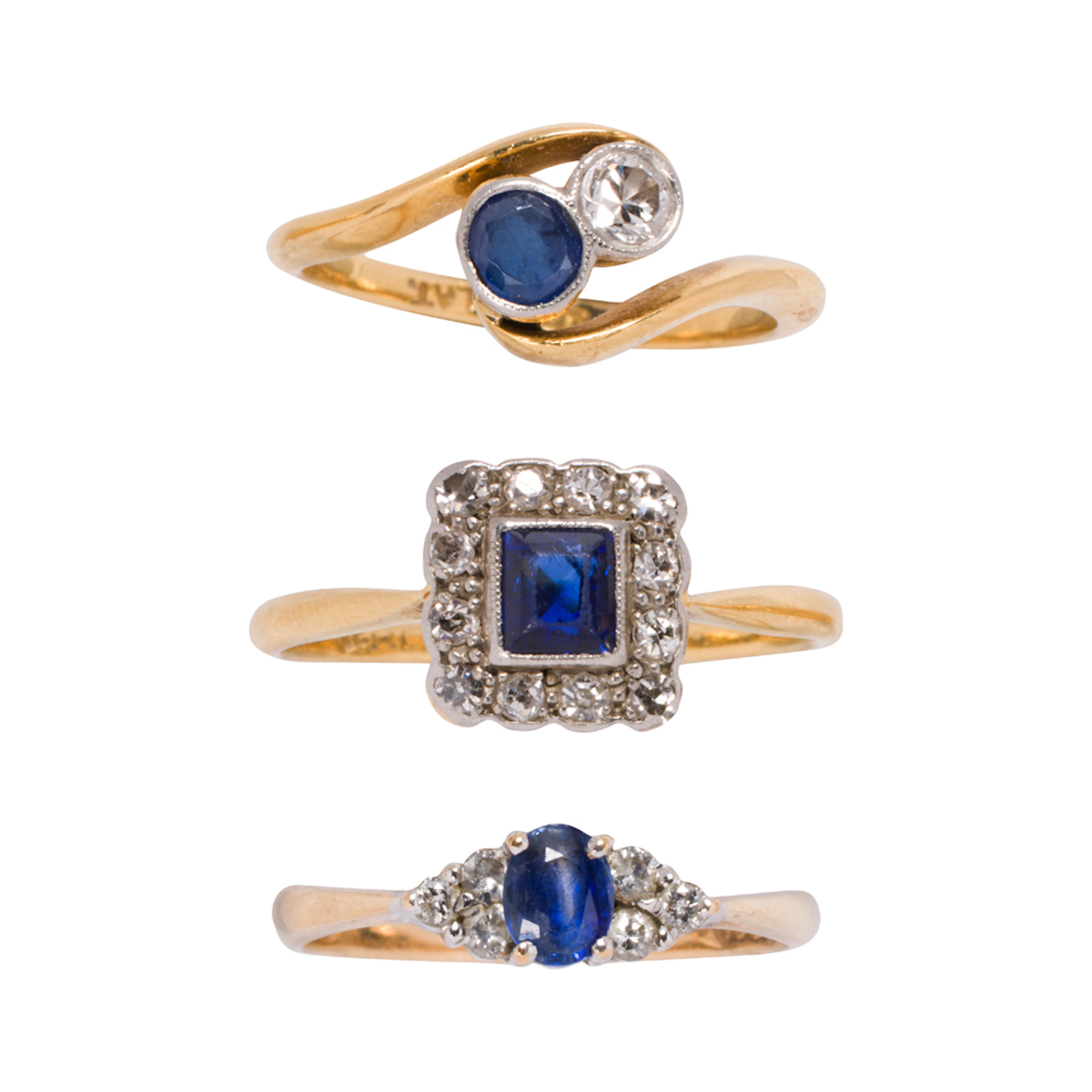Three sapphire, diamond, and 9k bi-color gold rings
