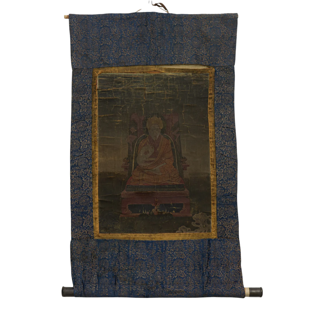 A Tibetan thangka of a lama